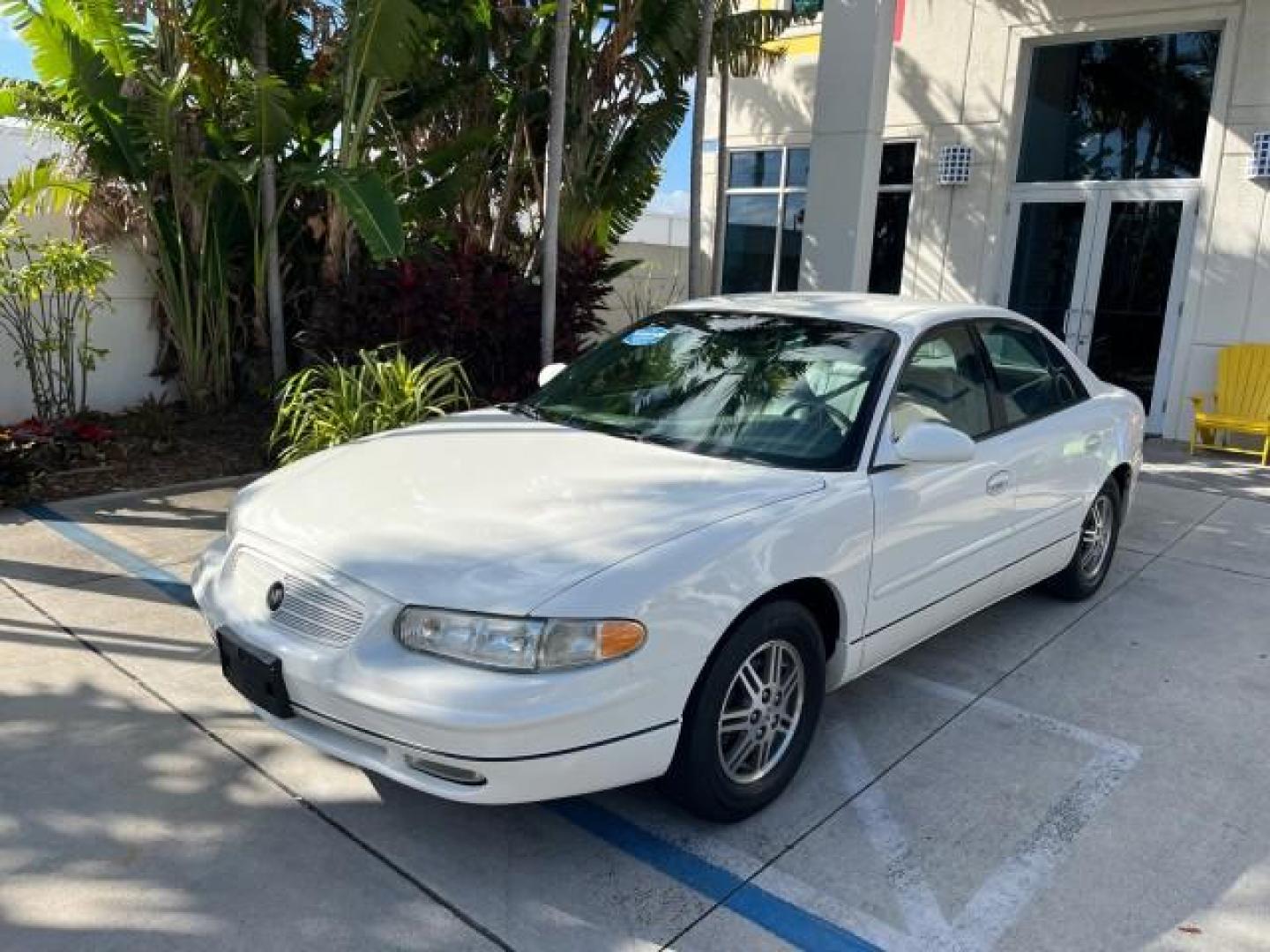 2003 White /Taupe Buick Regal LS LOW MILES 73,246 (2G4WB52K031) with an 3.8L 3800 V6 SFI Engine engine, Automatic transmission, located at 4701 North Dixie Hwy, Pompano Beach, FL, 33064, (954) 422-2889, 26.240938, -80.123474 - OUR WEBPAGE FLORIDACARS1.COM HAS OVER 100 PHOTOS AND FREE CARFAX LINK 2003 BUICK REGAL LS ROAD READY 3.8L V6 VIN: 2G4WB52K031174686 NO ACCIDENTS 29 MPG SEDAN 4 DR LOW MILES 73,246 3.8L V6 F 12V THE BEST POWER LEATHER SEATS GASOLINE 8 SERVICE RECORDS FRONT WHEEL DRIVE POWER MIRRORS DUAL AC Anti-Theft - Photo#93