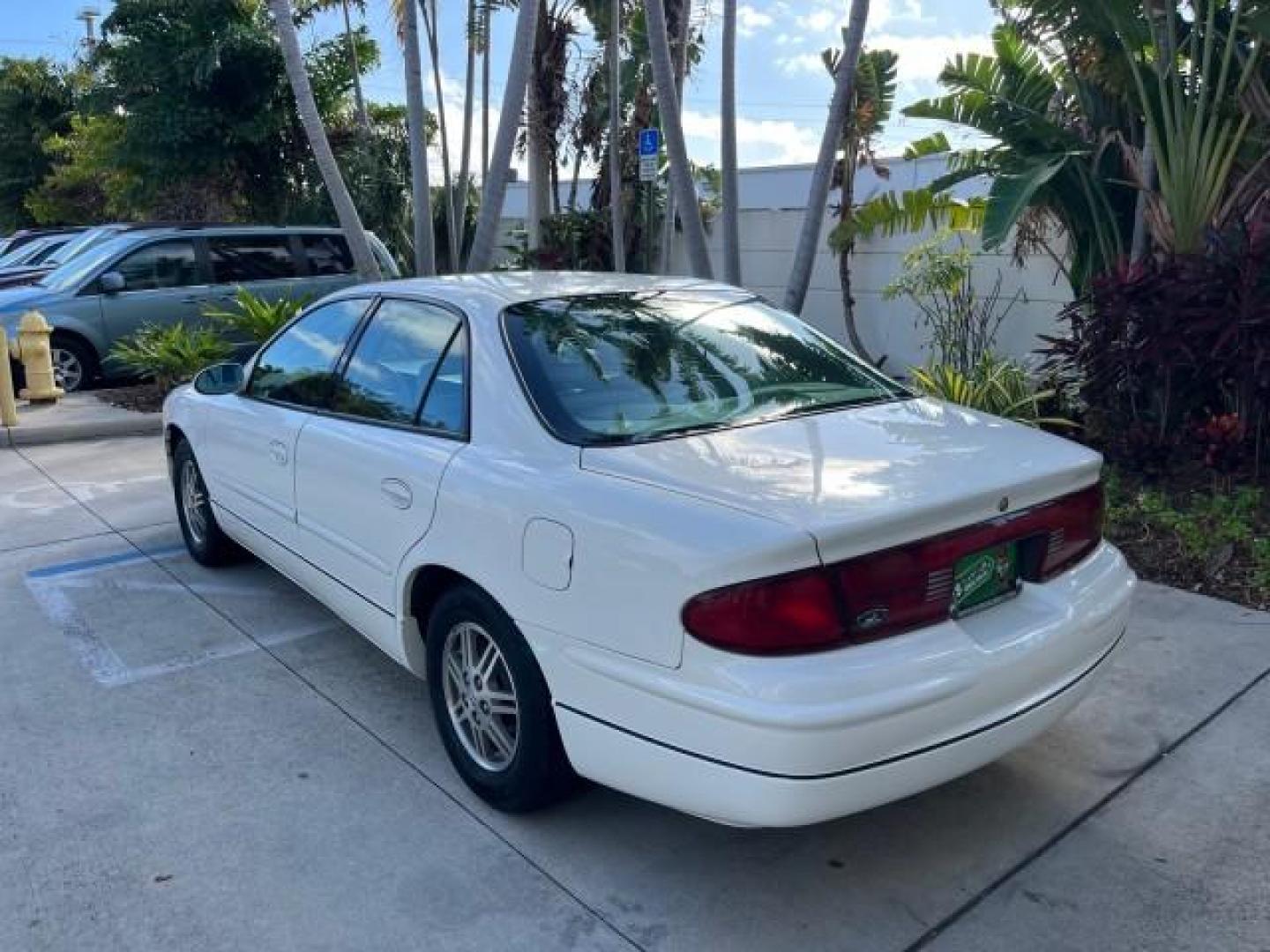 2003 White /Taupe Buick Regal LS LOW MILES 73,246 (2G4WB52K031) with an 3.8L 3800 V6 SFI Engine engine, Automatic transmission, located at 4701 North Dixie Hwy, Pompano Beach, FL, 33064, (954) 422-2889, 26.240938, -80.123474 - OUR WEBPAGE FLORIDACARS1.COM HAS OVER 100 PHOTOS AND FREE CARFAX LINK 2003 BUICK REGAL LS ROAD READY 3.8L V6 VIN: 2G4WB52K031174686 NO ACCIDENTS 29 MPG SEDAN 4 DR LOW MILES 73,246 3.8L V6 F 12V THE BEST POWER LEATHER SEATS GASOLINE 8 SERVICE RECORDS FRONT WHEEL DRIVE POWER MIRRORS DUAL AC Anti-Theft - Photo#96