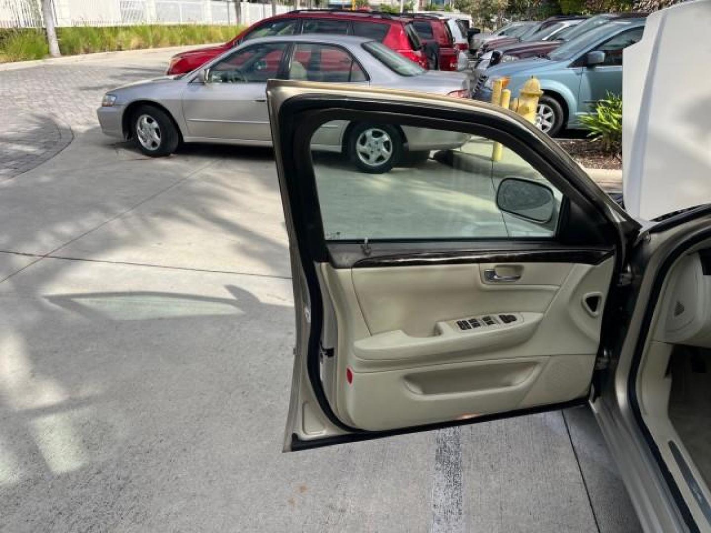 2009 Gold Mist /Light Linen Cadillac DTS w/1SA LOW MILES 36,460 (1G6KD57Y49U) with an Northstar 4.6L DOHC V8 Engine engine, Automatic transmission, located at 4701 North Dixie Hwy, Pompano Beach, FL, 33064, (954) 422-2889, 26.240938, -80.123474 - OUR WEBPAGE FLORIDACARS1.COM HAS OVER 100 PHOTOS AND FREE CARFAX LINK 2009 CADILLAC DTS ROAD READY 4.6L V8 VIN: 1G6KD57Y49U142303 NO ACCIDENTS FL OWNER SEDAN 4 DR NO RECALLS DUAL AC 4.6L V8 F DOHC 32V POWER LEATHER SEATS GASOLINE LOW MILES 36,460 FRONT WHEEL DRIVE NEW $46,280 NEW 12 SERVICE RECORDS - Photo#9