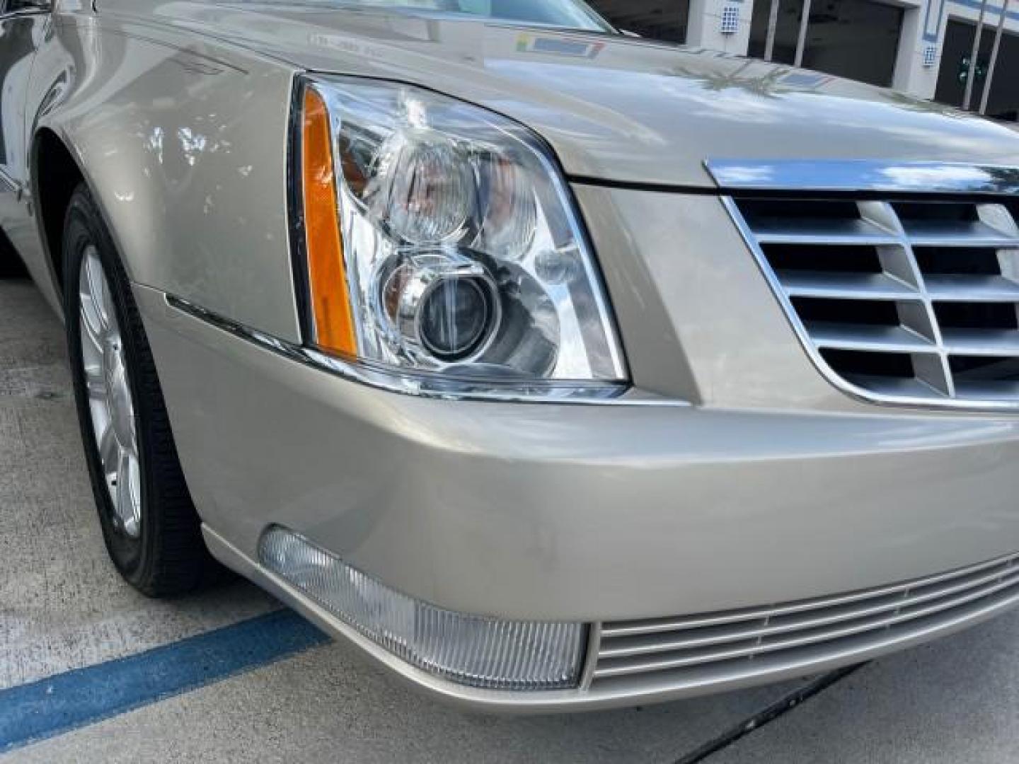 2009 Gold Mist /Light Linen Cadillac DTS w/1SA LOW MILES 36,460 (1G6KD57Y49U) with an Northstar 4.6L DOHC V8 Engine engine, Automatic transmission, located at 4701 North Dixie Hwy, Pompano Beach, FL, 33064, (954) 422-2889, 26.240938, -80.123474 - OUR WEBPAGE FLORIDACARS1.COM HAS OVER 100 PHOTOS AND FREE CARFAX LINK 2009 CADILLAC DTS ROAD READY 4.6L V8 VIN: 1G6KD57Y49U142303 NO ACCIDENTS FL OWNER SEDAN 4 DR NO RECALLS DUAL AC 4.6L V8 F DOHC 32V POWER LEATHER SEATS GASOLINE LOW MILES 36,460 FRONT WHEEL DRIVE NEW $46,280 NEW 12 SERVICE RECORDS - Photo#82