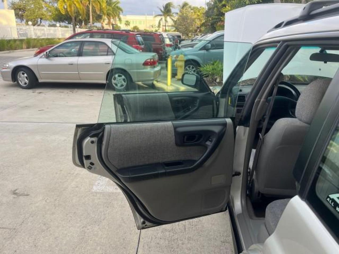 2001 Silverthorn Metallic /Gray Subaru Forester AWD 1 FL L LOW MILES 68,136 (JF1SF63541H) with an 2.5L SOHC SMPI 16-Valve 4-Cyl HO Boxer Engine engine, Automatic transmission, located at 4701 North Dixie Hwy, Pompano Beach, FL, 33064, (954) 422-2889, 26.240938, -80.123474 - OUR WEBPAGE FLORIDACARS1.COM HAS OVER 100 PHOTOS AND FREE CARFAX LINK 2001 SUBARU FORESTER L ROAD READY 2.5L H4 VIN: JF1SF63541H760202 NO ACCIDENTS AWD 4 DOOR WAGON/SPORT UTILITY NO RECALLS 28 MPG 2.5L H4 F SOHC 16V 1 OWNER FLORIDA GASOLINE LOW MILES 68,136 ALL WHEEL DRIVE ALL WHEEL DRIVE AWD Approa - Photo#13