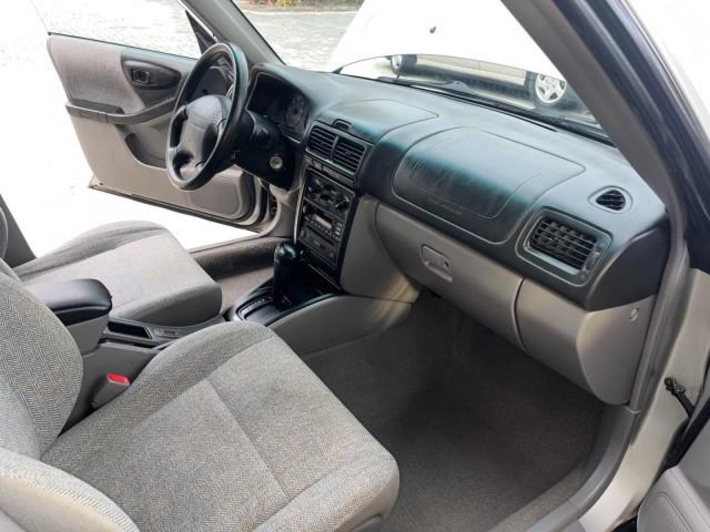 2001 Silverthorn Metallic /Gray Subaru Forester AWD 1 FL L LOW MILES 68,136 (JF1SF63541H) with an 2.5L SOHC SMPI 16-Valve 4-Cyl HO Boxer Engine engine, Automatic transmission, located at 4701 North Dixie Hwy, Pompano Beach, FL, 33064, (954) 422-2889, 26.240938, -80.123474 - OUR WEBPAGE FLORIDACARS1.COM HAS OVER 100 PHOTOS AND FREE CARFAX LINK 2001 SUBARU FORESTER L ROAD READY 2.5L H4 VIN: JF1SF63541H760202 NO ACCIDENTS AWD 4 DOOR WAGON/SPORT UTILITY NO RECALLS 28 MPG 2.5L H4 F SOHC 16V 1 OWNER FLORIDA GASOLINE LOW MILES 68,136 ALL WHEEL DRIVE ALL WHEEL DRIVE AWD Approa - Photo#26