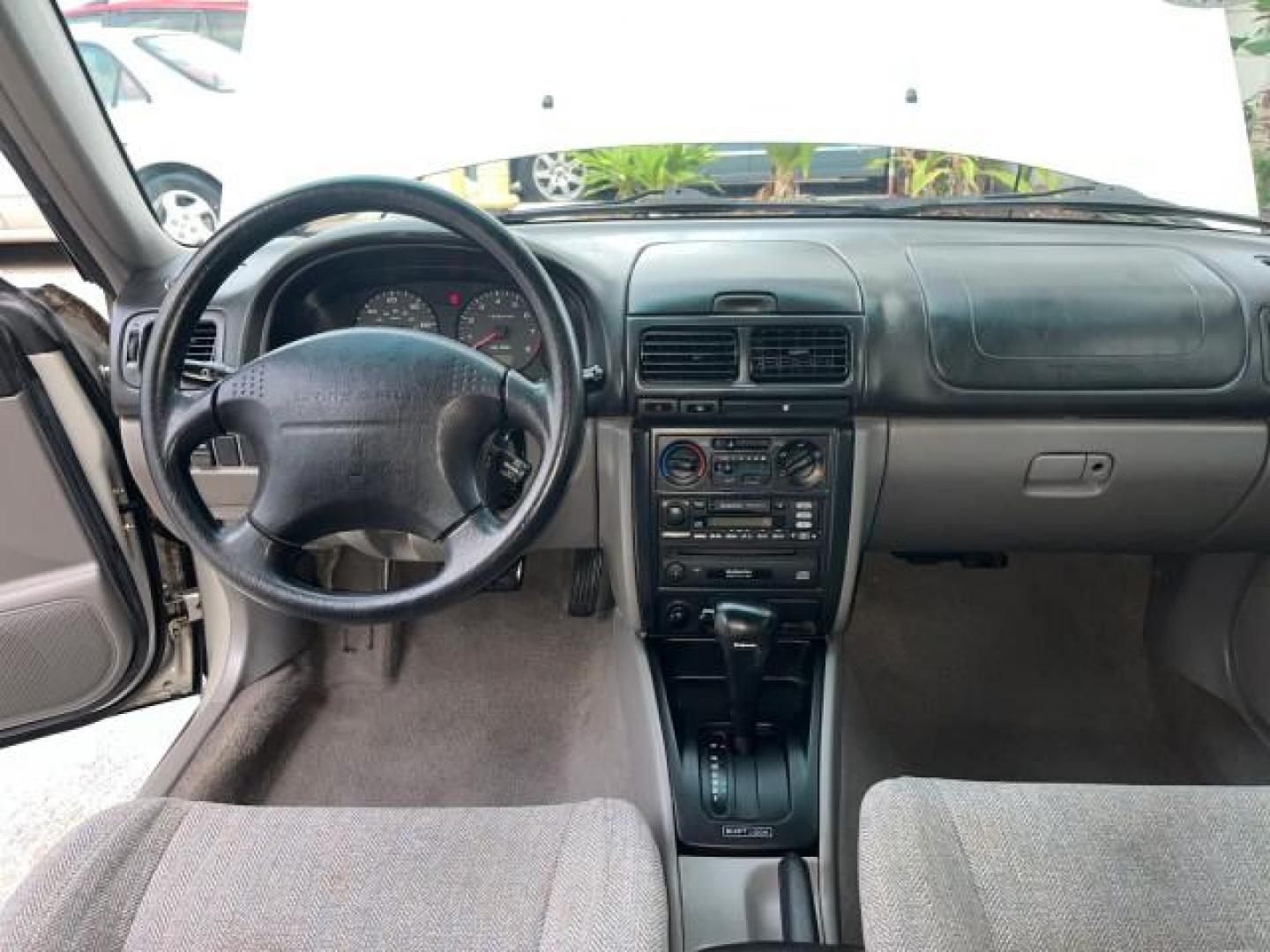 2001 Silverthorn Metallic /Gray Subaru Forester AWD 1 FL L LOW MILES 68,136 (JF1SF63541H) with an 2.5L SOHC SMPI 16-Valve 4-Cyl HO Boxer Engine engine, Automatic transmission, located at 4701 North Dixie Hwy, Pompano Beach, FL, 33064, (954) 422-2889, 26.240938, -80.123474 - OUR WEBPAGE FLORIDACARS1.COM HAS OVER 100 PHOTOS AND FREE CARFAX LINK 2001 SUBARU FORESTER L ROAD READY 2.5L H4 VIN: JF1SF63541H760202 NO ACCIDENTS AWD 4 DOOR WAGON/SPORT UTILITY NO RECALLS 28 MPG 2.5L H4 F SOHC 16V 1 OWNER FLORIDA GASOLINE LOW MILES 68,136 ALL WHEEL DRIVE ALL WHEEL DRIVE AWD Approa - Photo#32