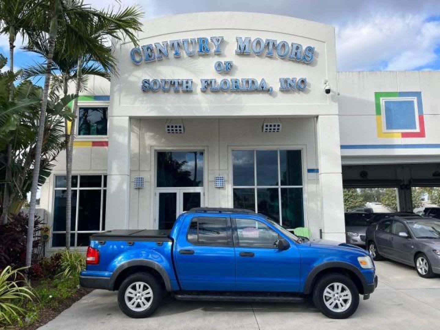 2010 Blue Flame Metallic /Dark Charcoal Ford Explorer Sport Trac 1 OWNER XLT LOW MILES 73,038 (1FMEU3BE9AU) with an 4.0L SOHC 12-Valve V6 Engine engine, Automatic transmission, located at 4701 North Dixie Hwy, Pompano Beach, FL, 33064, (954) 422-2889, 26.240938, -80.123474 - OUR WEBPAGE FLORIDACARS1.COM HAS OVER 100 PHOTOS AND FREE CARFAX LINK 2010 FORD EXPLORER SPORT TRAC XLT ROAD READY 4.0L V6 VIN: 1FMEU3BE9AUF01026 NO RECALLS 1 OWNER SPORT PICKUP LOW MILES 73,038 4.0L V6 F SOHC 12V 17 SERVICE RECORDS GASOLINE POWER SEATS 4.1FT BED REAR WHEEL DRIVE PARK SENSORS 4.1' B - Photo#0