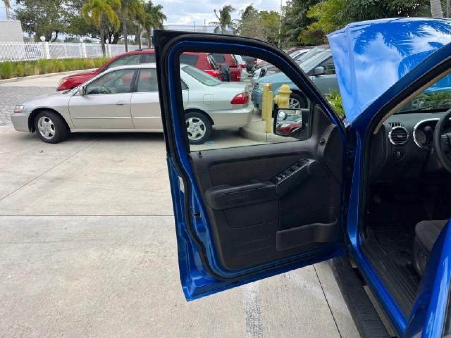 2010 Blue Flame Metallic /Dark Charcoal Ford Explorer Sport Trac 1 OWNER XLT LOW MILES 73,038 (1FMEU3BE9AU) with an 4.0L SOHC 12-Valve V6 Engine engine, Automatic transmission, located at 4701 North Dixie Hwy, Pompano Beach, FL, 33064, (954) 422-2889, 26.240938, -80.123474 - OUR WEBPAGE FLORIDACARS1.COM HAS OVER 100 PHOTOS AND FREE CARFAX LINK 2010 FORD EXPLORER SPORT TRAC XLT ROAD READY 4.0L V6 VIN: 1FMEU3BE9AUF01026 NO RECALLS 1 OWNER SPORT PICKUP LOW MILES 73,038 4.0L V6 F SOHC 12V 17 SERVICE RECORDS GASOLINE POWER SEATS 4.1FT BED REAR WHEEL DRIVE PARK SENSORS 4.1' B - Photo#9