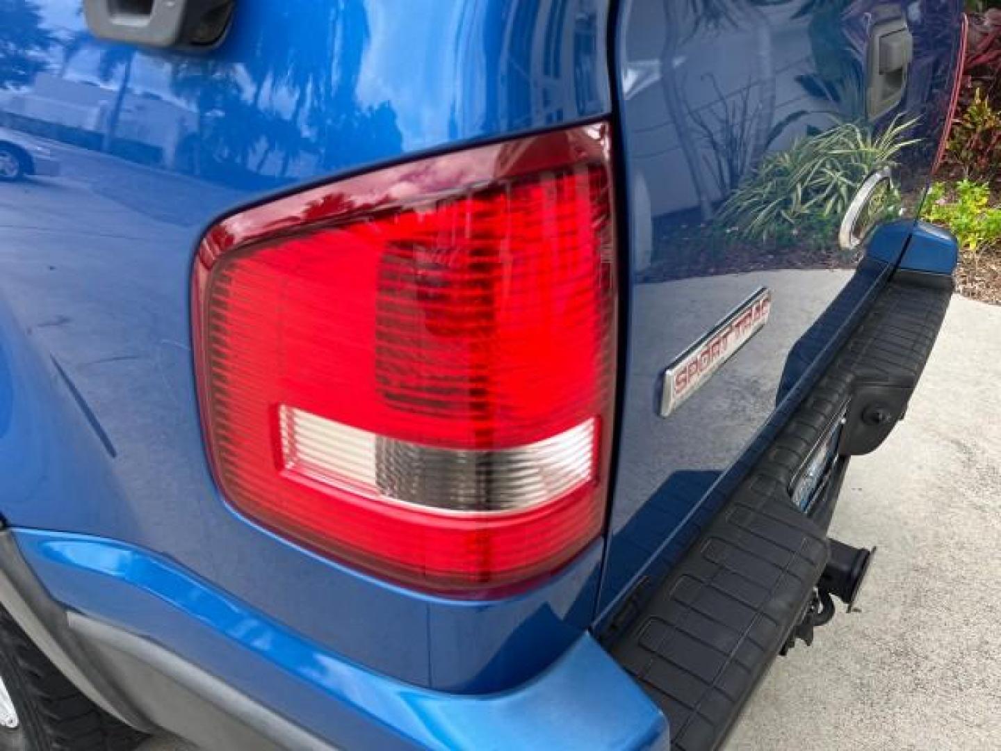 2010 Blue Flame Metallic /Dark Charcoal Ford Explorer Sport Trac 1 OWNER XLT LOW MILES 73,038 (1FMEU3BE9AU) with an 4.0L SOHC 12-Valve V6 Engine engine, Automatic transmission, located at 4701 North Dixie Hwy, Pompano Beach, FL, 33064, (954) 422-2889, 26.240938, -80.123474 - OUR WEBPAGE FLORIDACARS1.COM HAS OVER 100 PHOTOS AND FREE CARFAX LINK 2010 FORD EXPLORER SPORT TRAC XLT ROAD READY 4.0L V6 VIN: 1FMEU3BE9AUF01026 NO RECALLS 1 OWNER SPORT PICKUP LOW MILES 73,038 4.0L V6 F SOHC 12V 17 SERVICE RECORDS GASOLINE POWER SEATS 4.1FT BED REAR WHEEL DRIVE PARK SENSORS 4.1' B - Photo#99