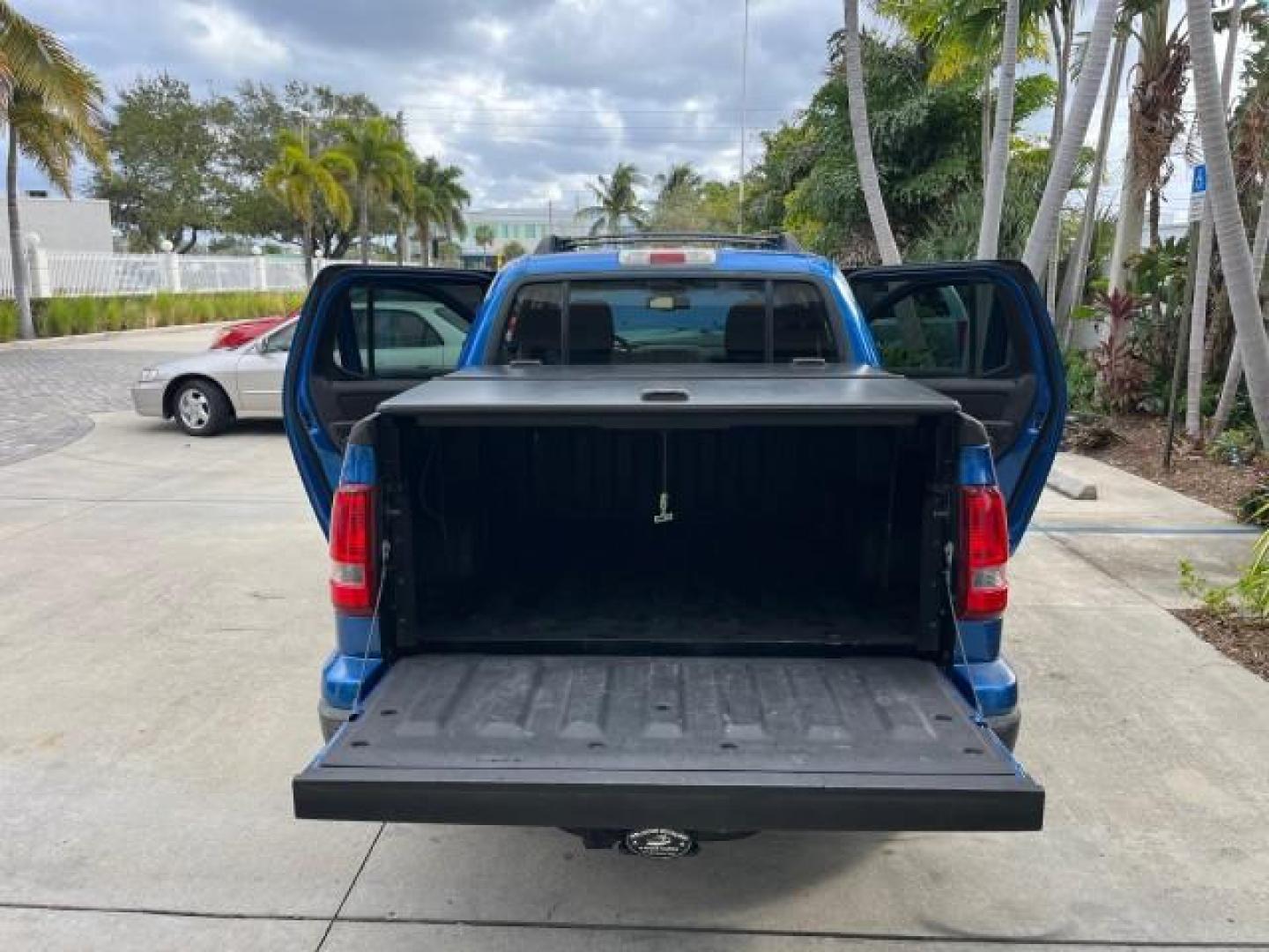 2010 Blue Flame Metallic /Dark Charcoal Ford Explorer Sport Trac 1 OWNER XLT LOW MILES 73,038 (1FMEU3BE9AU) with an 4.0L SOHC 12-Valve V6 Engine engine, Automatic transmission, located at 4701 North Dixie Hwy, Pompano Beach, FL, 33064, (954) 422-2889, 26.240938, -80.123474 - OUR WEBPAGE FLORIDACARS1.COM HAS OVER 100 PHOTOS AND FREE CARFAX LINK 2010 FORD EXPLORER SPORT TRAC XLT ROAD READY 4.0L V6 VIN: 1FMEU3BE9AUF01026 NO RECALLS 1 OWNER SPORT PICKUP LOW MILES 73,038 4.0L V6 F SOHC 12V 17 SERVICE RECORDS GASOLINE POWER SEATS 4.1FT BED REAR WHEEL DRIVE PARK SENSORS 4.1' B - Photo#15