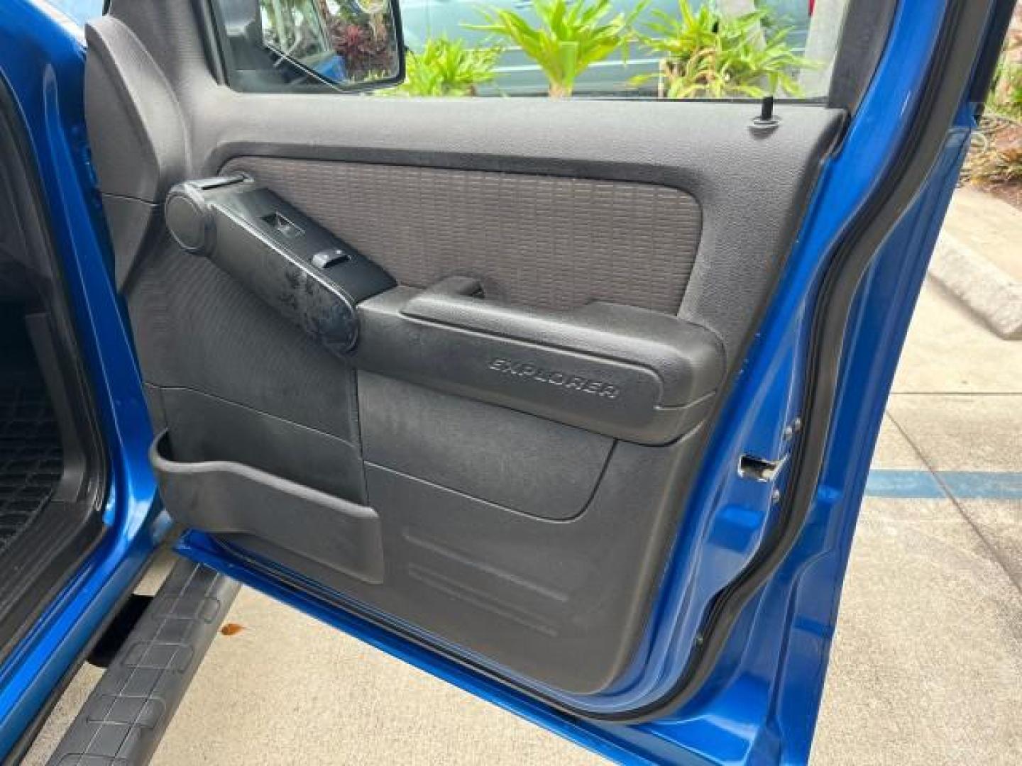 2010 Blue Flame Metallic /Dark Charcoal Ford Explorer Sport Trac 1 OWNER XLT LOW MILES 73,038 (1FMEU3BE9AU) with an 4.0L SOHC 12-Valve V6 Engine engine, Automatic transmission, located at 4701 North Dixie Hwy, Pompano Beach, FL, 33064, (954) 422-2889, 26.240938, -80.123474 - OUR WEBPAGE FLORIDACARS1.COM HAS OVER 100 PHOTOS AND FREE CARFAX LINK 2010 FORD EXPLORER SPORT TRAC XLT ROAD READY 4.0L V6 VIN: 1FMEU3BE9AUF01026 NO RECALLS 1 OWNER SPORT PICKUP LOW MILES 73,038 4.0L V6 F SOHC 12V 17 SERVICE RECORDS GASOLINE POWER SEATS 4.1FT BED REAR WHEEL DRIVE PARK SENSORS 4.1' B - Photo#24