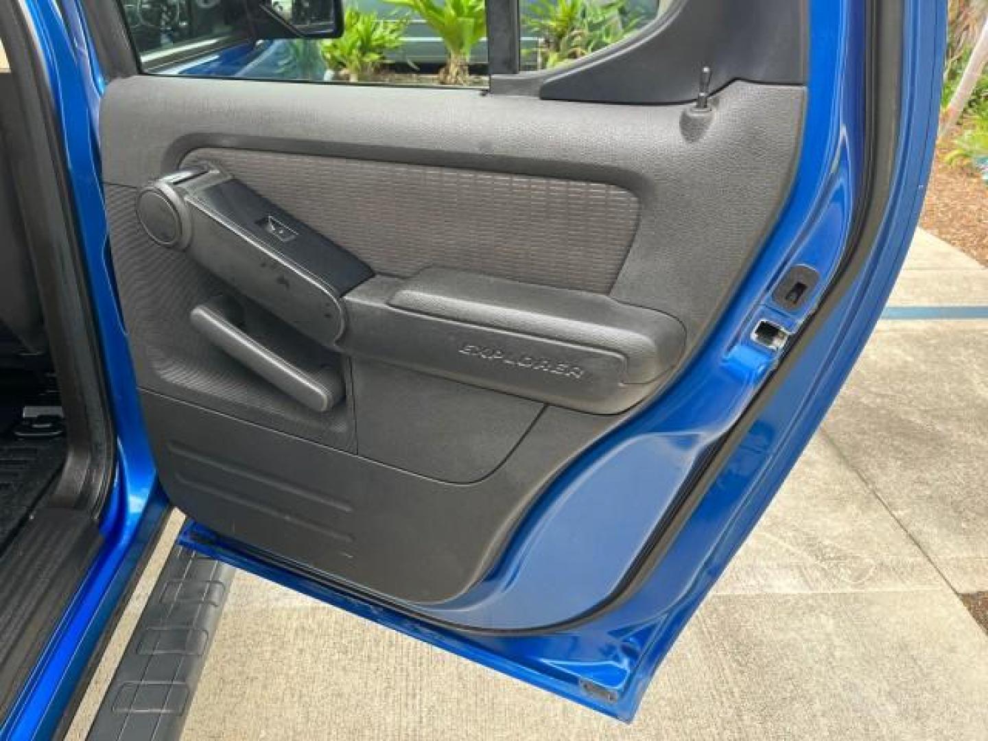 2010 Blue Flame Metallic /Dark Charcoal Ford Explorer Sport Trac 1 OWNER XLT LOW MILES 73,038 (1FMEU3BE9AU) with an 4.0L SOHC 12-Valve V6 Engine engine, Automatic transmission, located at 4701 North Dixie Hwy, Pompano Beach, FL, 33064, (954) 422-2889, 26.240938, -80.123474 - OUR WEBPAGE FLORIDACARS1.COM HAS OVER 100 PHOTOS AND FREE CARFAX LINK 2010 FORD EXPLORER SPORT TRAC XLT ROAD READY 4.0L V6 VIN: 1FMEU3BE9AUF01026 NO RECALLS 1 OWNER SPORT PICKUP LOW MILES 73,038 4.0L V6 F SOHC 12V 17 SERVICE RECORDS GASOLINE POWER SEATS 4.1FT BED REAR WHEEL DRIVE PARK SENSORS 4.1' B - Photo#29