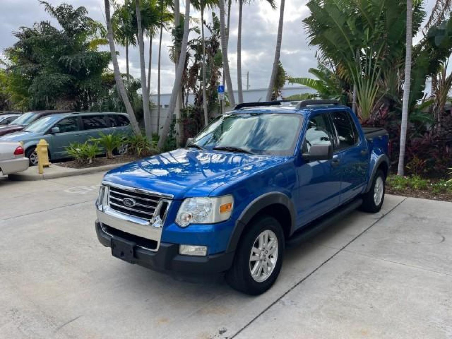 2010 Blue Flame Metallic /Dark Charcoal Ford Explorer Sport Trac 1 OWNER XLT LOW MILES 73,038 (1FMEU3BE9AU) with an 4.0L SOHC 12-Valve V6 Engine engine, Automatic transmission, located at 4701 North Dixie Hwy, Pompano Beach, FL, 33064, (954) 422-2889, 26.240938, -80.123474 - OUR WEBPAGE FLORIDACARS1.COM HAS OVER 100 PHOTOS AND FREE CARFAX LINK 2010 FORD EXPLORER SPORT TRAC XLT ROAD READY 4.0L V6 VIN: 1FMEU3BE9AUF01026 NO RECALLS 1 OWNER SPORT PICKUP LOW MILES 73,038 4.0L V6 F SOHC 12V 17 SERVICE RECORDS GASOLINE POWER SEATS 4.1FT BED REAR WHEEL DRIVE PARK SENSORS 4.1' B - Photo#3