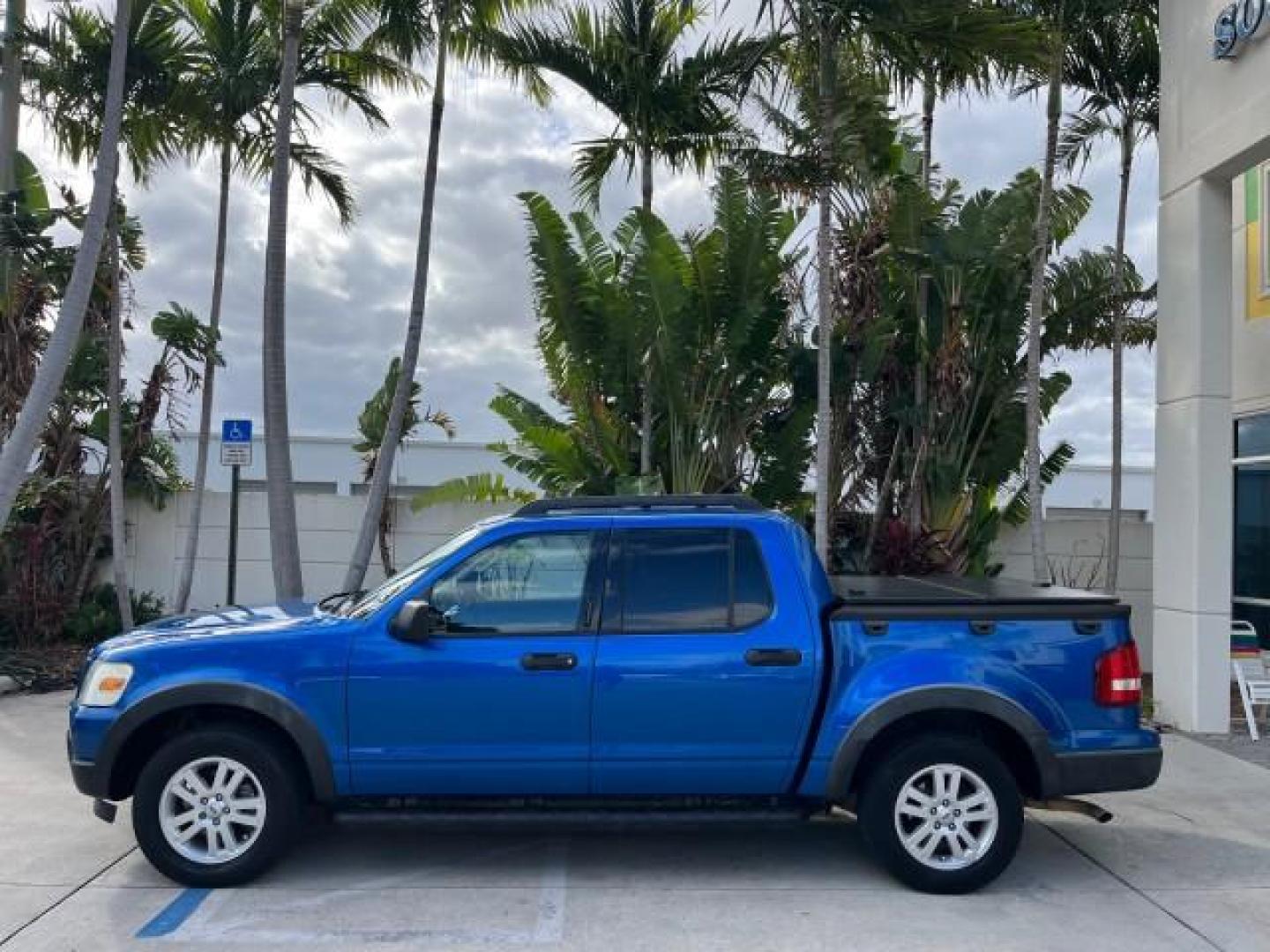 2010 Blue Flame Metallic /Dark Charcoal Ford Explorer Sport Trac 1 OWNER XLT LOW MILES 73,038 (1FMEU3BE9AU) with an 4.0L SOHC 12-Valve V6 Engine engine, Automatic transmission, located at 4701 North Dixie Hwy, Pompano Beach, FL, 33064, (954) 422-2889, 26.240938, -80.123474 - OUR WEBPAGE FLORIDACARS1.COM HAS OVER 100 PHOTOS AND FREE CARFAX LINK 2010 FORD EXPLORER SPORT TRAC XLT ROAD READY 4.0L V6 VIN: 1FMEU3BE9AUF01026 NO RECALLS 1 OWNER SPORT PICKUP LOW MILES 73,038 4.0L V6 F SOHC 12V 17 SERVICE RECORDS GASOLINE POWER SEATS 4.1FT BED REAR WHEEL DRIVE PARK SENSORS 4.1' B - Photo#4