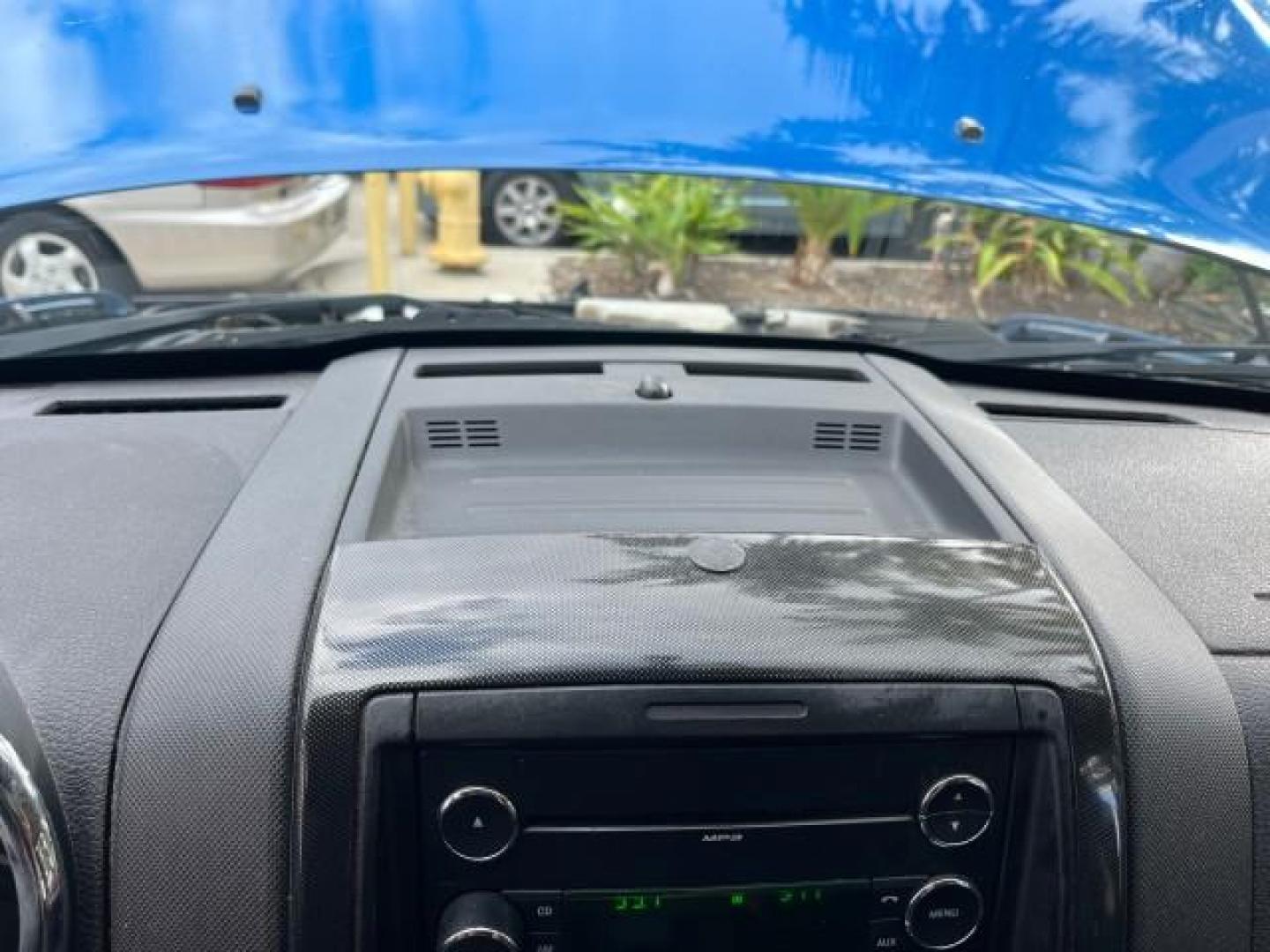 2010 Blue Flame Metallic /Dark Charcoal Ford Explorer Sport Trac 1 OWNER XLT LOW MILES 73,038 (1FMEU3BE9AU) with an 4.0L SOHC 12-Valve V6 Engine engine, Automatic transmission, located at 4701 North Dixie Hwy, Pompano Beach, FL, 33064, (954) 422-2889, 26.240938, -80.123474 - OUR WEBPAGE FLORIDACARS1.COM HAS OVER 100 PHOTOS AND FREE CARFAX LINK 2010 FORD EXPLORER SPORT TRAC XLT ROAD READY 4.0L V6 VIN: 1FMEU3BE9AUF01026 NO RECALLS 1 OWNER SPORT PICKUP LOW MILES 73,038 4.0L V6 F SOHC 12V 17 SERVICE RECORDS GASOLINE POWER SEATS 4.1FT BED REAR WHEEL DRIVE PARK SENSORS 4.1' B - Photo#58