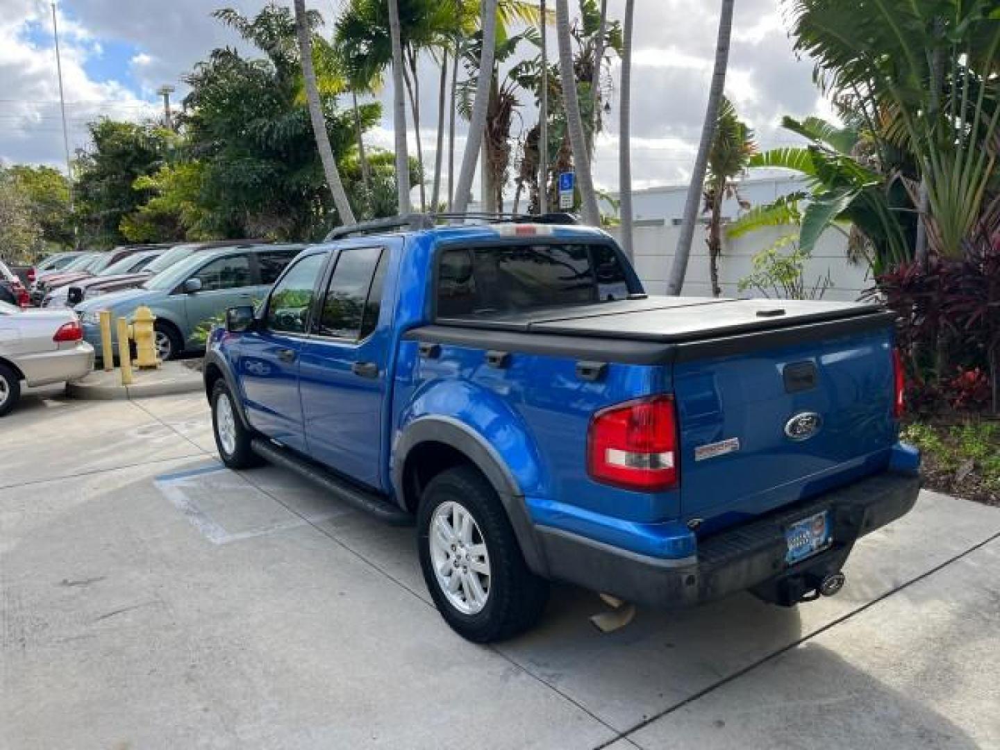 2010 Blue Flame Metallic /Dark Charcoal Ford Explorer Sport Trac 1 OWNER XLT LOW MILES 73,038 (1FMEU3BE9AU) with an 4.0L SOHC 12-Valve V6 Engine engine, Automatic transmission, located at 4701 North Dixie Hwy, Pompano Beach, FL, 33064, (954) 422-2889, 26.240938, -80.123474 - OUR WEBPAGE FLORIDACARS1.COM HAS OVER 100 PHOTOS AND FREE CARFAX LINK 2010 FORD EXPLORER SPORT TRAC XLT ROAD READY 4.0L V6 VIN: 1FMEU3BE9AUF01026 NO RECALLS 1 OWNER SPORT PICKUP LOW MILES 73,038 4.0L V6 F SOHC 12V 17 SERVICE RECORDS GASOLINE POWER SEATS 4.1FT BED REAR WHEEL DRIVE PARK SENSORS 4.1' B - Photo#5