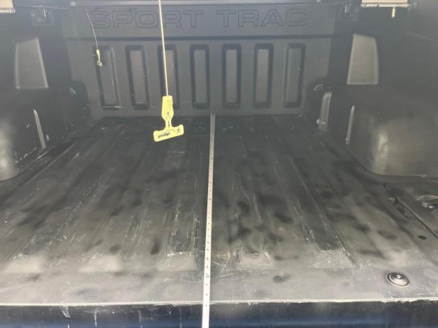 2010 Blue Flame Metallic /Dark Charcoal Ford Explorer Sport Trac 1 OWNER XLT LOW MILES 73,038 (1FMEU3BE9AU) with an 4.0L SOHC 12-Valve V6 Engine engine, Automatic transmission, located at 4701 North Dixie Hwy, Pompano Beach, FL, 33064, (954) 422-2889, 26.240938, -80.123474 - OUR WEBPAGE FLORIDACARS1.COM HAS OVER 100 PHOTOS AND FREE CARFAX LINK 2010 FORD EXPLORER SPORT TRAC XLT ROAD READY 4.0L V6 VIN: 1FMEU3BE9AUF01026 NO RECALLS 1 OWNER SPORT PICKUP LOW MILES 73,038 4.0L V6 F SOHC 12V 17 SERVICE RECORDS GASOLINE POWER SEATS 4.1FT BED REAR WHEEL DRIVE PARK SENSORS 4.1' B - Photo#62