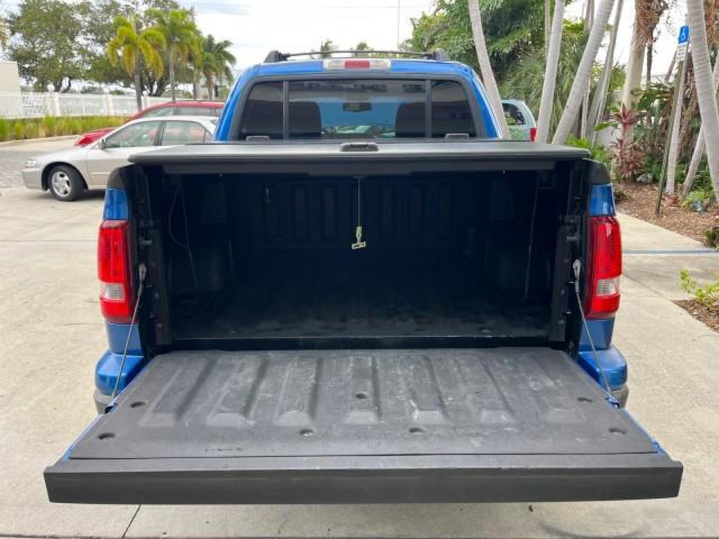 2010 Blue Flame Metallic /Dark Charcoal Ford Explorer Sport Trac 1 OWNER XLT LOW MILES 73,038 (1FMEU3BE9AU) with an 4.0L SOHC 12-Valve V6 Engine engine, Automatic transmission, located at 4701 North Dixie Hwy, Pompano Beach, FL, 33064, (954) 422-2889, 26.240938, -80.123474 - OUR WEBPAGE FLORIDACARS1.COM HAS OVER 100 PHOTOS AND FREE CARFAX LINK 2010 FORD EXPLORER SPORT TRAC XLT ROAD READY 4.0L V6 VIN: 1FMEU3BE9AUF01026 NO RECALLS 1 OWNER SPORT PICKUP LOW MILES 73,038 4.0L V6 F SOHC 12V 17 SERVICE RECORDS GASOLINE POWER SEATS 4.1FT BED REAR WHEEL DRIVE PARK SENSORS 4.1' B - Photo#64