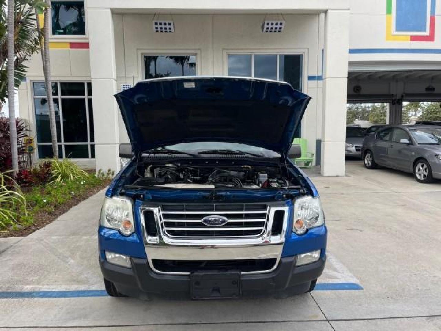 2010 Blue Flame Metallic /Dark Charcoal Ford Explorer Sport Trac 1 OWNER XLT LOW MILES 73,038 (1FMEU3BE9AU) with an 4.0L SOHC 12-Valve V6 Engine engine, Automatic transmission, located at 4701 North Dixie Hwy, Pompano Beach, FL, 33064, (954) 422-2889, 26.240938, -80.123474 - OUR WEBPAGE FLORIDACARS1.COM HAS OVER 100 PHOTOS AND FREE CARFAX LINK 2010 FORD EXPLORER SPORT TRAC XLT ROAD READY 4.0L V6 VIN: 1FMEU3BE9AUF01026 NO RECALLS 1 OWNER SPORT PICKUP LOW MILES 73,038 4.0L V6 F SOHC 12V 17 SERVICE RECORDS GASOLINE POWER SEATS 4.1FT BED REAR WHEEL DRIVE PARK SENSORS 4.1' B - Photo#67