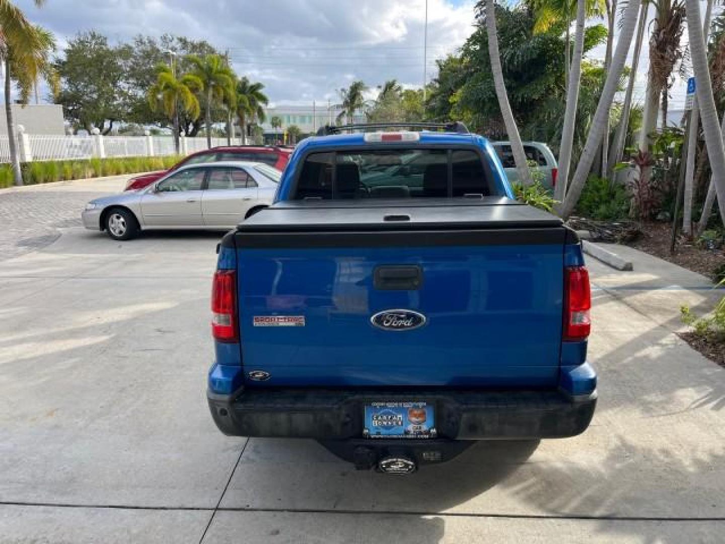 2010 Blue Flame Metallic /Dark Charcoal Ford Explorer Sport Trac 1 OWNER XLT LOW MILES 73,038 (1FMEU3BE9AU) with an 4.0L SOHC 12-Valve V6 Engine engine, Automatic transmission, located at 4701 North Dixie Hwy, Pompano Beach, FL, 33064, (954) 422-2889, 26.240938, -80.123474 - OUR WEBPAGE FLORIDACARS1.COM HAS OVER 100 PHOTOS AND FREE CARFAX LINK 2010 FORD EXPLORER SPORT TRAC XLT ROAD READY 4.0L V6 VIN: 1FMEU3BE9AUF01026 NO RECALLS 1 OWNER SPORT PICKUP LOW MILES 73,038 4.0L V6 F SOHC 12V 17 SERVICE RECORDS GASOLINE POWER SEATS 4.1FT BED REAR WHEEL DRIVE PARK SENSORS 4.1' B - Photo#6