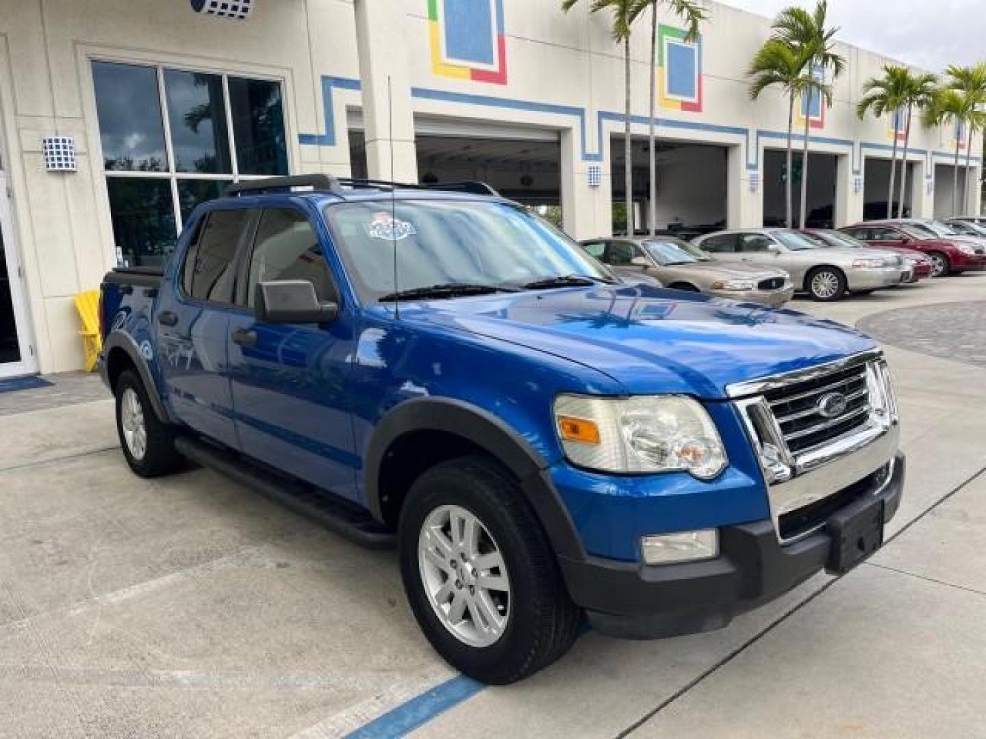2010 Blue Flame Metallic /Dark Charcoal Ford Explorer Sport Trac 1 OWNER XLT LOW MILES 73,038 (1FMEU3BE9AU) with an 4.0L SOHC 12-Valve V6 Engine engine, Automatic transmission, located at 4701 North Dixie Hwy, Pompano Beach, FL, 33064, (954) 422-2889, 26.240938, -80.123474 - OUR WEBPAGE FLORIDACARS1.COM HAS OVER 100 PHOTOS AND FREE CARFAX LINK 2010 FORD EXPLORER SPORT TRAC XLT ROAD READY 4.0L V6 VIN: 1FMEU3BE9AUF01026 NO RECALLS 1 OWNER SPORT PICKUP LOW MILES 73,038 4.0L V6 F SOHC 12V 17 SERVICE RECORDS GASOLINE POWER SEATS 4.1FT BED REAR WHEEL DRIVE PARK SENSORS 4.1' B - Photo#74