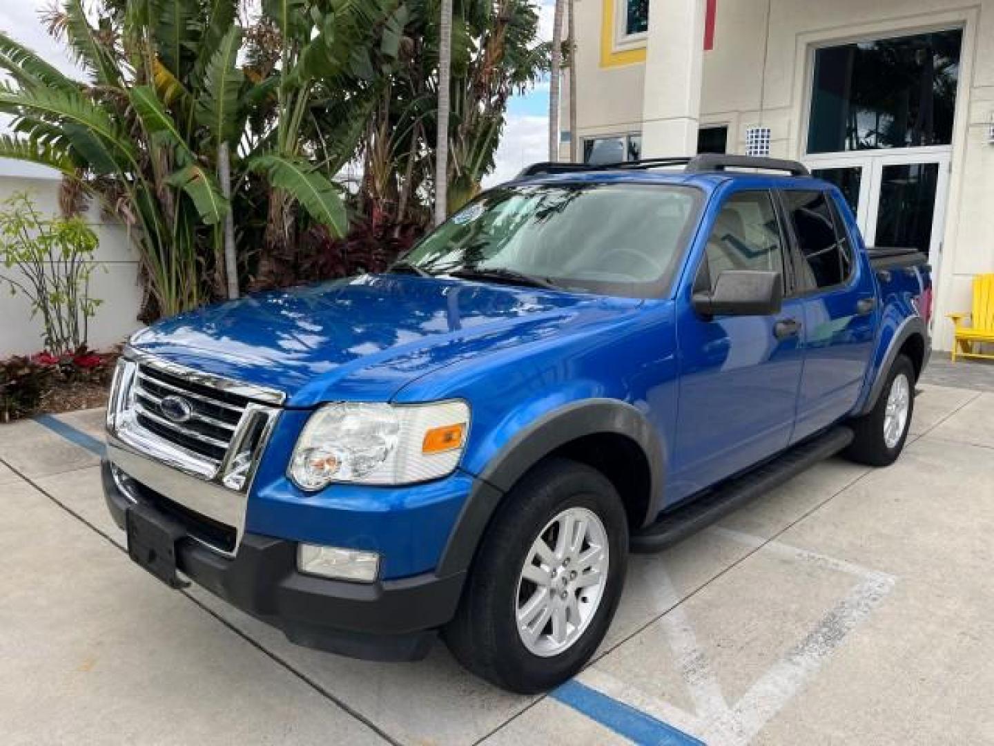 2010 Blue Flame Metallic /Dark Charcoal Ford Explorer Sport Trac 1 OWNER XLT LOW MILES 73,038 (1FMEU3BE9AU) with an 4.0L SOHC 12-Valve V6 Engine engine, Automatic transmission, located at 4701 North Dixie Hwy, Pompano Beach, FL, 33064, (954) 422-2889, 26.240938, -80.123474 - OUR WEBPAGE FLORIDACARS1.COM HAS OVER 100 PHOTOS AND FREE CARFAX LINK 2010 FORD EXPLORER SPORT TRAC XLT ROAD READY 4.0L V6 VIN: 1FMEU3BE9AUF01026 NO RECALLS 1 OWNER SPORT PICKUP LOW MILES 73,038 4.0L V6 F SOHC 12V 17 SERVICE RECORDS GASOLINE POWER SEATS 4.1FT BED REAR WHEEL DRIVE PARK SENSORS 4.1' B - Photo#75