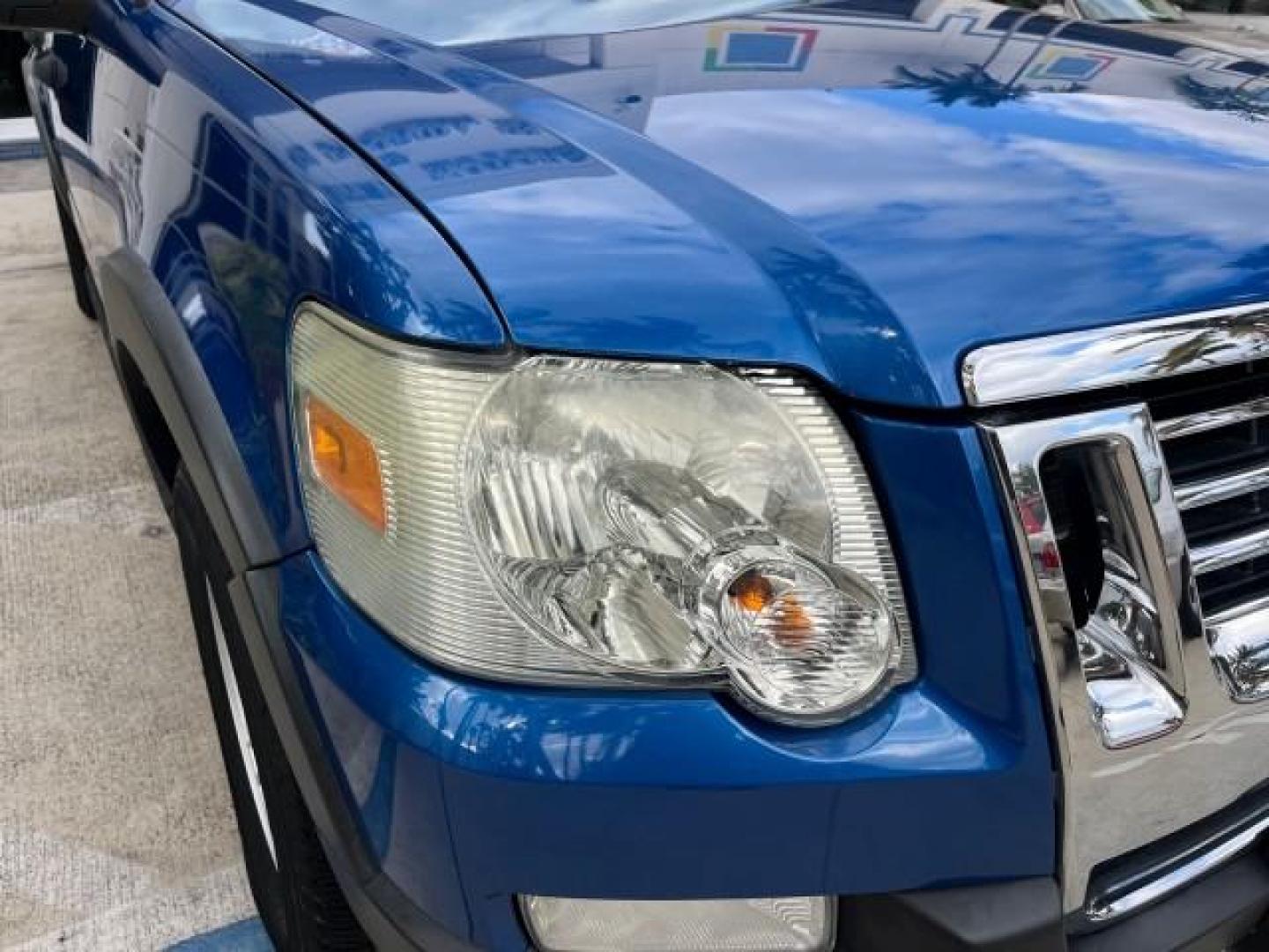 2010 Blue Flame Metallic /Dark Charcoal Ford Explorer Sport Trac 1 OWNER XLT LOW MILES 73,038 (1FMEU3BE9AU) with an 4.0L SOHC 12-Valve V6 Engine engine, Automatic transmission, located at 4701 North Dixie Hwy, Pompano Beach, FL, 33064, (954) 422-2889, 26.240938, -80.123474 - OUR WEBPAGE FLORIDACARS1.COM HAS OVER 100 PHOTOS AND FREE CARFAX LINK 2010 FORD EXPLORER SPORT TRAC XLT ROAD READY 4.0L V6 VIN: 1FMEU3BE9AUF01026 NO RECALLS 1 OWNER SPORT PICKUP LOW MILES 73,038 4.0L V6 F SOHC 12V 17 SERVICE RECORDS GASOLINE POWER SEATS 4.1FT BED REAR WHEEL DRIVE PARK SENSORS 4.1' B - Photo#77