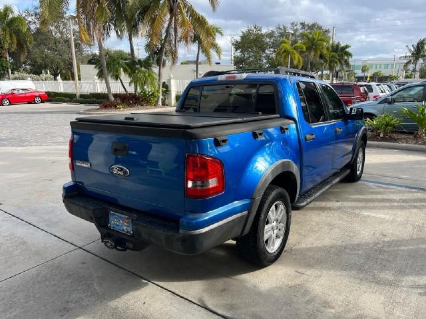 2010 Blue Flame Metallic /Dark Charcoal Ford Explorer Sport Trac 1 OWNER XLT LOW MILES 73,038 (1FMEU3BE9AU) with an 4.0L SOHC 12-Valve V6 Engine engine, Automatic transmission, located at 4701 North Dixie Hwy, Pompano Beach, FL, 33064, (954) 422-2889, 26.240938, -80.123474 - OUR WEBPAGE FLORIDACARS1.COM HAS OVER 100 PHOTOS AND FREE CARFAX LINK 2010 FORD EXPLORER SPORT TRAC XLT ROAD READY 4.0L V6 VIN: 1FMEU3BE9AUF01026 NO RECALLS 1 OWNER SPORT PICKUP LOW MILES 73,038 4.0L V6 F SOHC 12V 17 SERVICE RECORDS GASOLINE POWER SEATS 4.1FT BED REAR WHEEL DRIVE PARK SENSORS 4.1' B - Photo#7