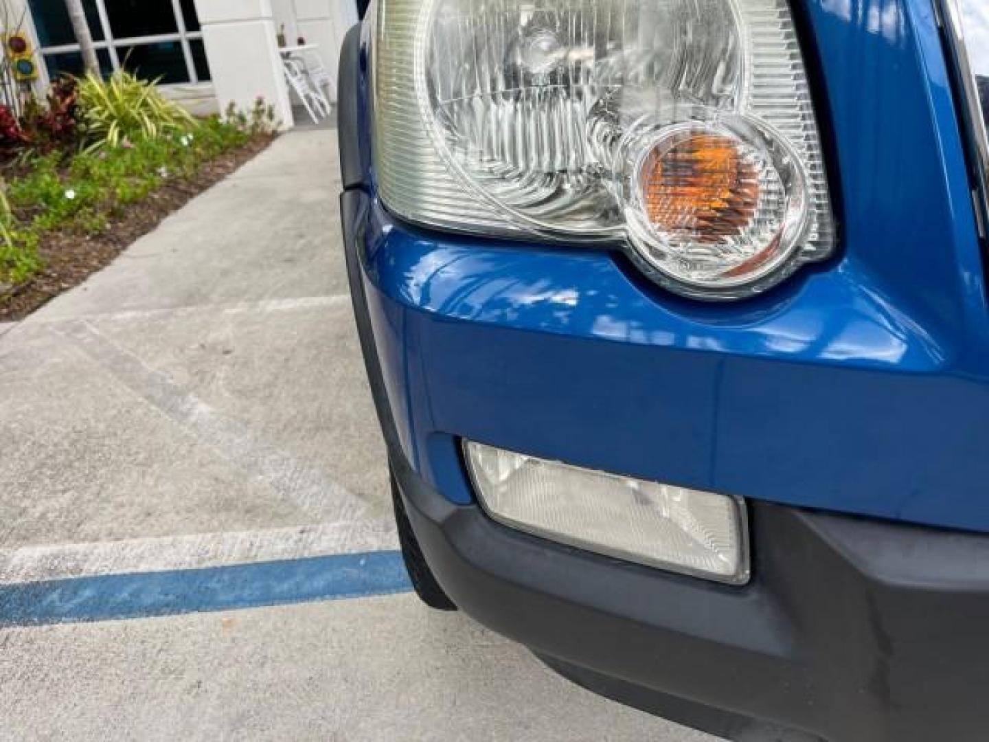 2010 Blue Flame Metallic /Dark Charcoal Ford Explorer Sport Trac 1 OWNER XLT LOW MILES 73,038 (1FMEU3BE9AU) with an 4.0L SOHC 12-Valve V6 Engine engine, Automatic transmission, located at 4701 North Dixie Hwy, Pompano Beach, FL, 33064, (954) 422-2889, 26.240938, -80.123474 - OUR WEBPAGE FLORIDACARS1.COM HAS OVER 100 PHOTOS AND FREE CARFAX LINK 2010 FORD EXPLORER SPORT TRAC XLT ROAD READY 4.0L V6 VIN: 1FMEU3BE9AUF01026 NO RECALLS 1 OWNER SPORT PICKUP LOW MILES 73,038 4.0L V6 F SOHC 12V 17 SERVICE RECORDS GASOLINE POWER SEATS 4.1FT BED REAR WHEEL DRIVE PARK SENSORS 4.1' B - Photo#80