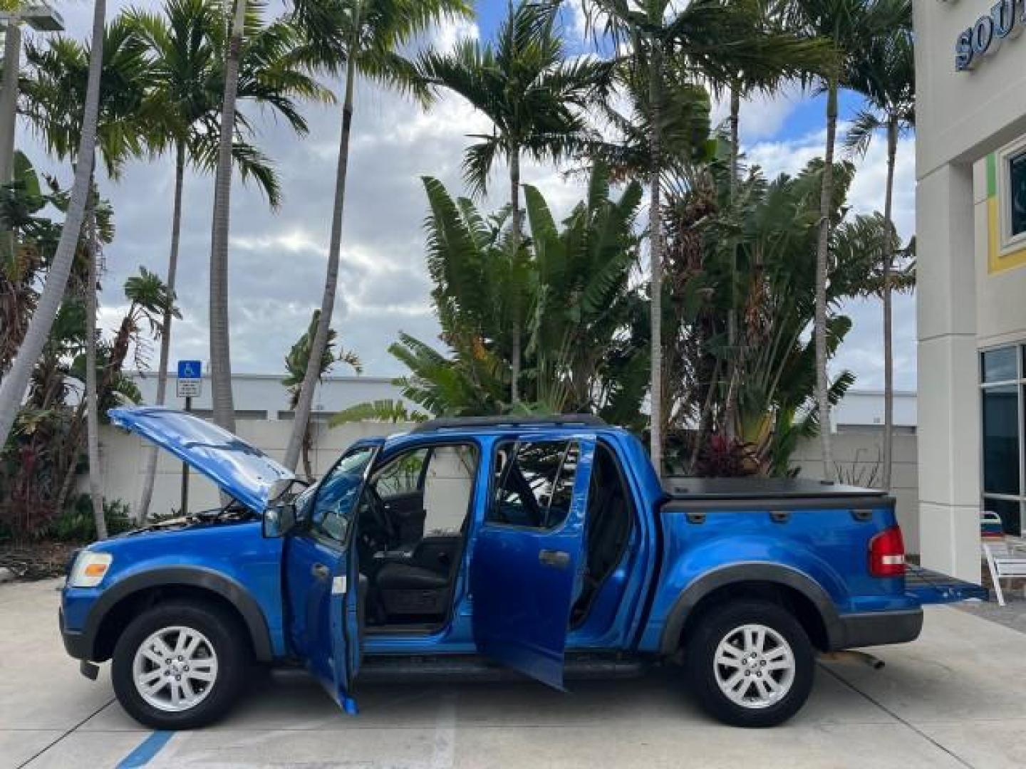 2010 Blue Flame Metallic /Dark Charcoal Ford Explorer Sport Trac 1 OWNER XLT LOW MILES 73,038 (1FMEU3BE9AU) with an 4.0L SOHC 12-Valve V6 Engine engine, Automatic transmission, located at 4701 North Dixie Hwy, Pompano Beach, FL, 33064, (954) 422-2889, 26.240938, -80.123474 - OUR WEBPAGE FLORIDACARS1.COM HAS OVER 100 PHOTOS AND FREE CARFAX LINK 2010 FORD EXPLORER SPORT TRAC XLT ROAD READY 4.0L V6 VIN: 1FMEU3BE9AUF01026 NO RECALLS 1 OWNER SPORT PICKUP LOW MILES 73,038 4.0L V6 F SOHC 12V 17 SERVICE RECORDS GASOLINE POWER SEATS 4.1FT BED REAR WHEEL DRIVE PARK SENSORS 4.1' B - Photo#8