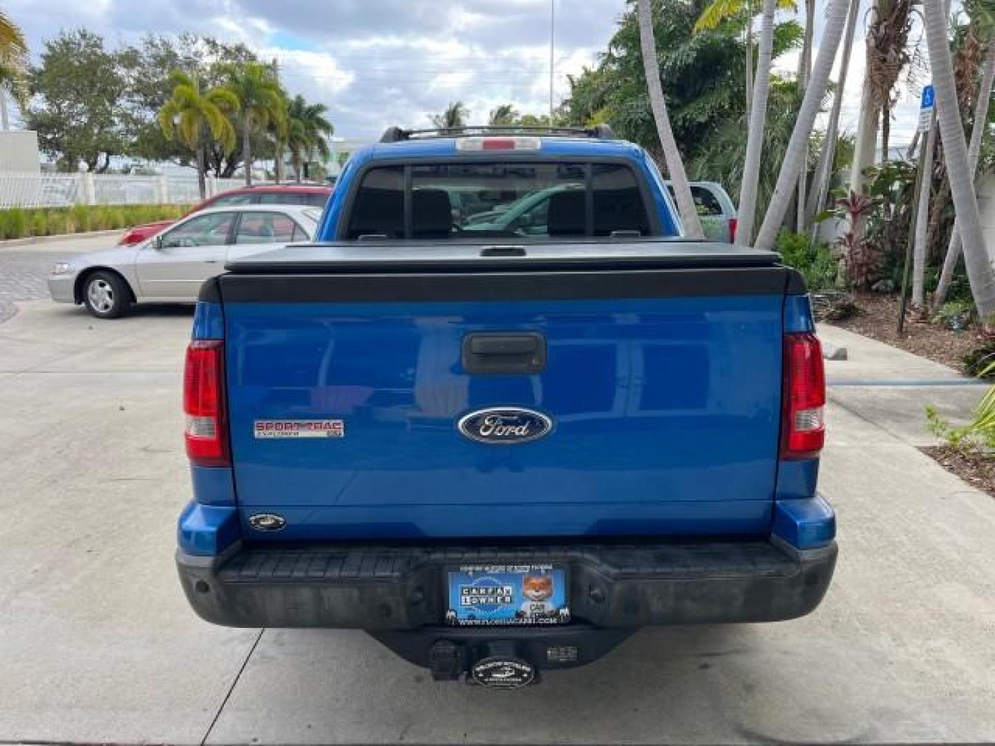 2010 Blue Flame Metallic /Dark Charcoal Ford Explorer Sport Trac 1 OWNER XLT LOW MILES 73,038 (1FMEU3BE9AU) with an 4.0L SOHC 12-Valve V6 Engine engine, Automatic transmission, located at 4701 North Dixie Hwy, Pompano Beach, FL, 33064, (954) 422-2889, 26.240938, -80.123474 - OUR WEBPAGE FLORIDACARS1.COM HAS OVER 100 PHOTOS AND FREE CARFAX LINK 2010 FORD EXPLORER SPORT TRAC XLT ROAD READY 4.0L V6 VIN: 1FMEU3BE9AUF01026 NO RECALLS 1 OWNER SPORT PICKUP LOW MILES 73,038 4.0L V6 F SOHC 12V 17 SERVICE RECORDS GASOLINE POWER SEATS 4.1FT BED REAR WHEEL DRIVE PARK SENSORS 4.1' B - Photo#93