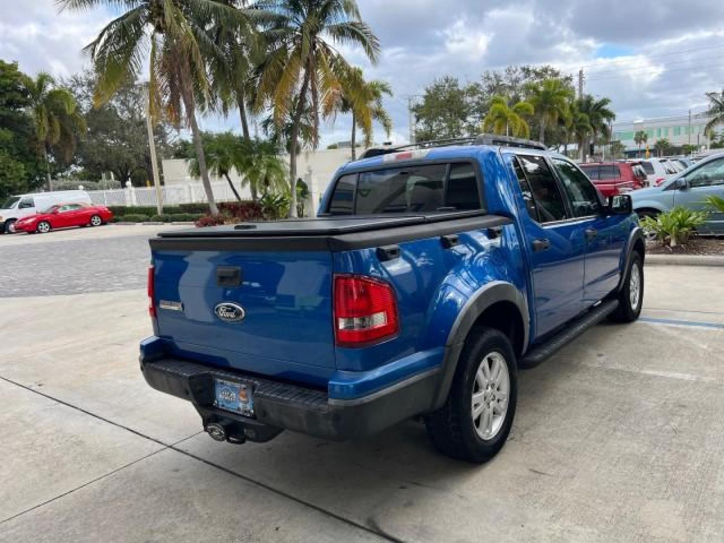 2010 Blue Flame Metallic /Dark Charcoal Ford Explorer Sport Trac 1 OWNER XLT LOW MILES 73,038 (1FMEU3BE9AU) with an 4.0L SOHC 12-Valve V6 Engine engine, Automatic transmission, located at 4701 North Dixie Hwy, Pompano Beach, FL, 33064, (954) 422-2889, 26.240938, -80.123474 - OUR WEBPAGE FLORIDACARS1.COM HAS OVER 100 PHOTOS AND FREE CARFAX LINK 2010 FORD EXPLORER SPORT TRAC XLT ROAD READY 4.0L V6 VIN: 1FMEU3BE9AUF01026 NO RECALLS 1 OWNER SPORT PICKUP LOW MILES 73,038 4.0L V6 F SOHC 12V 17 SERVICE RECORDS GASOLINE POWER SEATS 4.1FT BED REAR WHEEL DRIVE PARK SENSORS 4.1' B - Photo#94