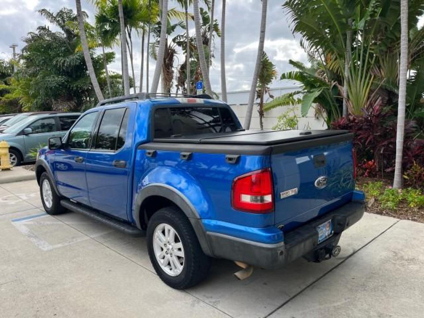 2010 Blue Flame Metallic /Dark Charcoal Ford Explorer Sport Trac 1 OWNER XLT LOW MILES 73,038 (1FMEU3BE9AU) with an 4.0L SOHC 12-Valve V6 Engine engine, Automatic transmission, located at 4701 North Dixie Hwy, Pompano Beach, FL, 33064, (954) 422-2889, 26.240938, -80.123474 - OUR WEBPAGE FLORIDACARS1.COM HAS OVER 100 PHOTOS AND FREE CARFAX LINK 2010 FORD EXPLORER SPORT TRAC XLT ROAD READY 4.0L V6 VIN: 1FMEU3BE9AUF01026 NO RECALLS 1 OWNER SPORT PICKUP LOW MILES 73,038 4.0L V6 F SOHC 12V 17 SERVICE RECORDS GASOLINE POWER SEATS 4.1FT BED REAR WHEEL DRIVE PARK SENSORS 4.1' B - Photo#95