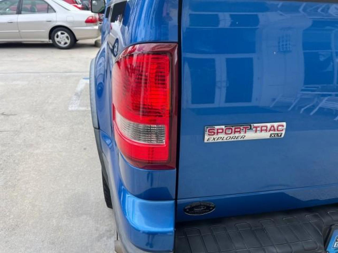 2010 Blue Flame Metallic /Dark Charcoal Ford Explorer Sport Trac 1 OWNER XLT LOW MILES 73,038 (1FMEU3BE9AU) with an 4.0L SOHC 12-Valve V6 Engine engine, Automatic transmission, located at 4701 North Dixie Hwy, Pompano Beach, FL, 33064, (954) 422-2889, 26.240938, -80.123474 - OUR WEBPAGE FLORIDACARS1.COM HAS OVER 100 PHOTOS AND FREE CARFAX LINK 2010 FORD EXPLORER SPORT TRAC XLT ROAD READY 4.0L V6 VIN: 1FMEU3BE9AUF01026 NO RECALLS 1 OWNER SPORT PICKUP LOW MILES 73,038 4.0L V6 F SOHC 12V 17 SERVICE RECORDS GASOLINE POWER SEATS 4.1FT BED REAR WHEEL DRIVE PARK SENSORS 4.1' B - Photo#96