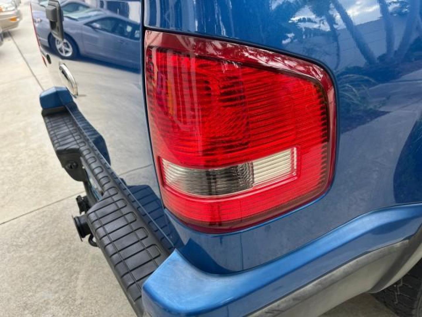 2010 Blue Flame Metallic /Dark Charcoal Ford Explorer Sport Trac 1 OWNER XLT LOW MILES 73,038 (1FMEU3BE9AU) with an 4.0L SOHC 12-Valve V6 Engine engine, Automatic transmission, located at 4701 North Dixie Hwy, Pompano Beach, FL, 33064, (954) 422-2889, 26.240938, -80.123474 - OUR WEBPAGE FLORIDACARS1.COM HAS OVER 100 PHOTOS AND FREE CARFAX LINK 2010 FORD EXPLORER SPORT TRAC XLT ROAD READY 4.0L V6 VIN: 1FMEU3BE9AUF01026 NO RECALLS 1 OWNER SPORT PICKUP LOW MILES 73,038 4.0L V6 F SOHC 12V 17 SERVICE RECORDS GASOLINE POWER SEATS 4.1FT BED REAR WHEEL DRIVE PARK SENSORS 4.1' B - Photo#98