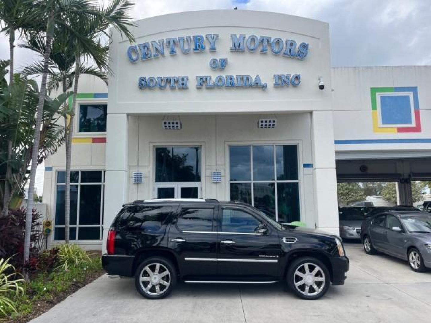 2007 Black Raven /Ebony/Ebony Cadillac Escalade NAV LOW MILES 58,551 (1GYEC63867R) with an 6.2L Vortec 1000 VVT V8 SFI Engine engine, Automatic transmission, located at 4701 North Dixie Hwy, Pompano Beach, FL, 33064, (954) 422-2889, 26.240938, -80.123474 - OUR WEBPAGE FLORIDACARS1.COM HAS OVER 100 PHOTOS AND FREE CARFAX LINK 2007 CADILLAC ESCALADE NEW $61,810 ROAD READY 6.2L V8 VIN: 1GYEC63867R257164 NO ACCIDENTS NO RECALLS 4 DOOR WAGON/SPORT UTILITY LOW MILES 58,551 SUNROOF 6.2L V8 F DUAL AC 3 ROW LEATHER SEATS GASOLINE POWER SEATS BACK UP CAMERA NAV - Photo#0