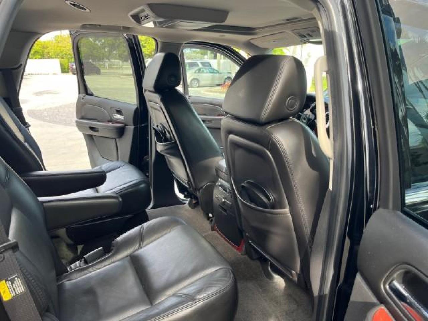 2007 Black Raven /Ebony/Ebony Cadillac Escalade NAV LOW MILES 58,551 (1GYEC63867R) with an 6.2L Vortec 1000 VVT V8 SFI Engine engine, Automatic transmission, located at 4701 North Dixie Hwy, Pompano Beach, FL, 33064, (954) 422-2889, 26.240938, -80.123474 - OUR WEBPAGE FLORIDACARS1.COM HAS OVER 100 PHOTOS AND FREE CARFAX LINK 2007 CADILLAC ESCALADE NEW $61,810 ROAD READY 6.2L V8 VIN: 1GYEC63867R257164 NO ACCIDENTS NO RECALLS 4 DOOR WAGON/SPORT UTILITY LOW MILES 58,551 SUNROOF 6.2L V8 F DUAL AC 3 ROW LEATHER SEATS GASOLINE POWER SEATS BACK UP CAMERA NAV - Photo#33