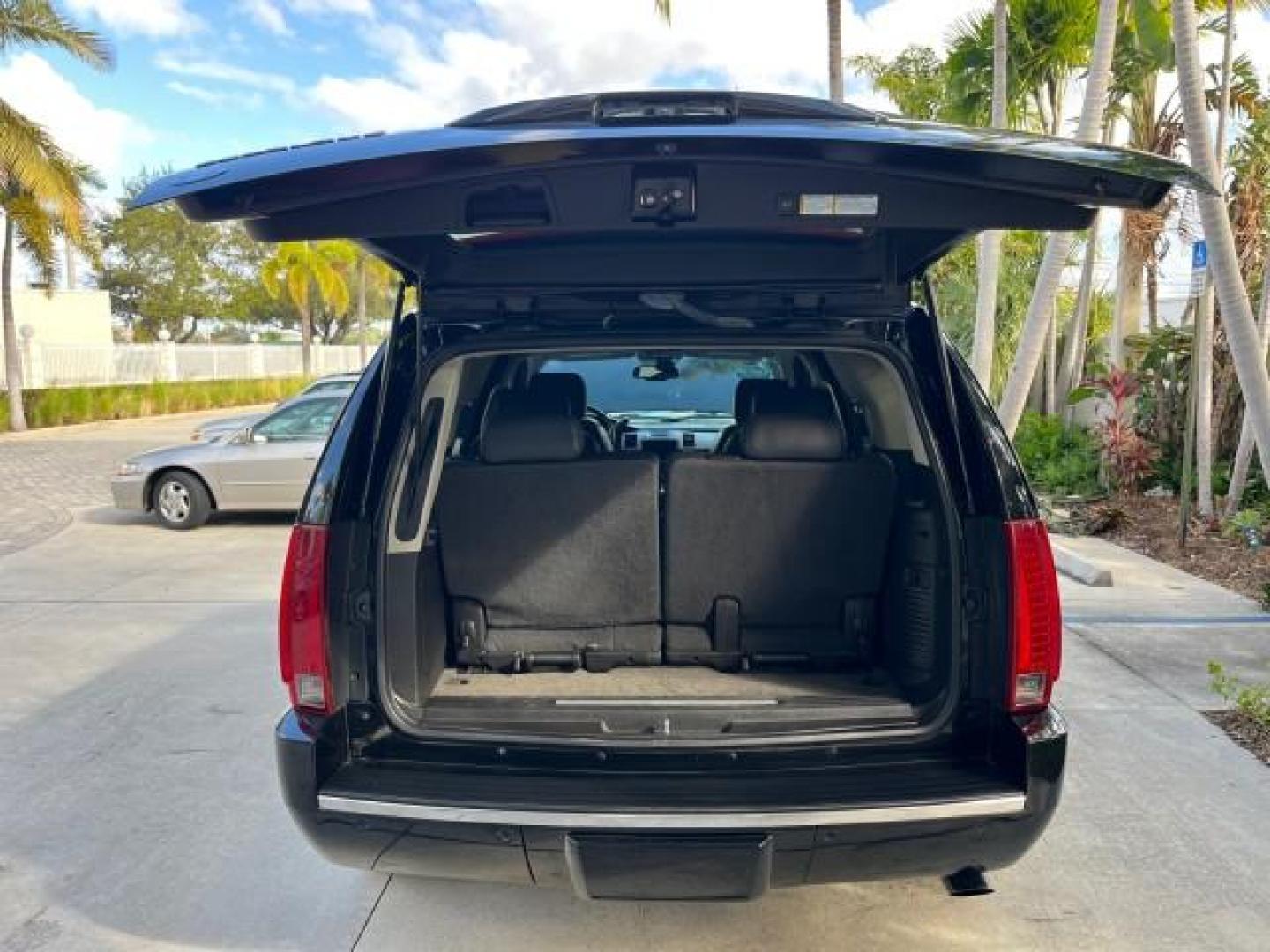 2007 Black Raven /Ebony/Ebony Cadillac Escalade NAV LOW MILES 58,551 (1GYEC63867R) with an 6.2L Vortec 1000 VVT V8 SFI Engine engine, Automatic transmission, located at 4701 North Dixie Hwy, Pompano Beach, FL, 33064, (954) 422-2889, 26.240938, -80.123474 - OUR WEBPAGE FLORIDACARS1.COM HAS OVER 100 PHOTOS AND FREE CARFAX LINK 2007 CADILLAC ESCALADE NEW $61,810 ROAD READY 6.2L V8 VIN: 1GYEC63867R257164 NO ACCIDENTS NO RECALLS 4 DOOR WAGON/SPORT UTILITY LOW MILES 58,551 SUNROOF 6.2L V8 F DUAL AC 3 ROW LEATHER SEATS GASOLINE POWER SEATS BACK UP CAMERA NAV - Photo#73