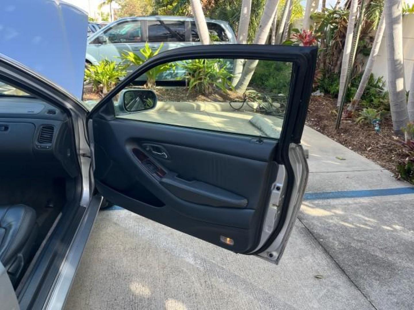 2000 Satin Silver Metallic /Charcoal Honda Accord Cpe EX w/Leather LOW MILES 70,130 (1HGCG2250YA) with an 3.0L SOHC VTEC 24-Valve V6 LEV-Certified Engine engine, Automatic transmission, located at 4701 North Dixie Hwy, Pompano Beach, FL, 33064, (954) 422-2889, 26.240938, -80.123474 - OUR WEBPAGE FLORIDACARS1.COM HAS OVER 100 PHOTOS AND FREE CARFAX LINK 2000 HONDA ACCORD EX V6 ROAD READY 3.0L V6 VIN: 1HGCG2250YA038316 FLORIDA OWNER COUPE POWER LEATHER SEATS 3.0L V6 F SOHC 24V POWER SUNROOF GASOLINE 28 MPG FRONT WHEEL DRIVE LOW MILES 70,130 Alloy Wheels Anti-Theft System Automatic - Photo#11