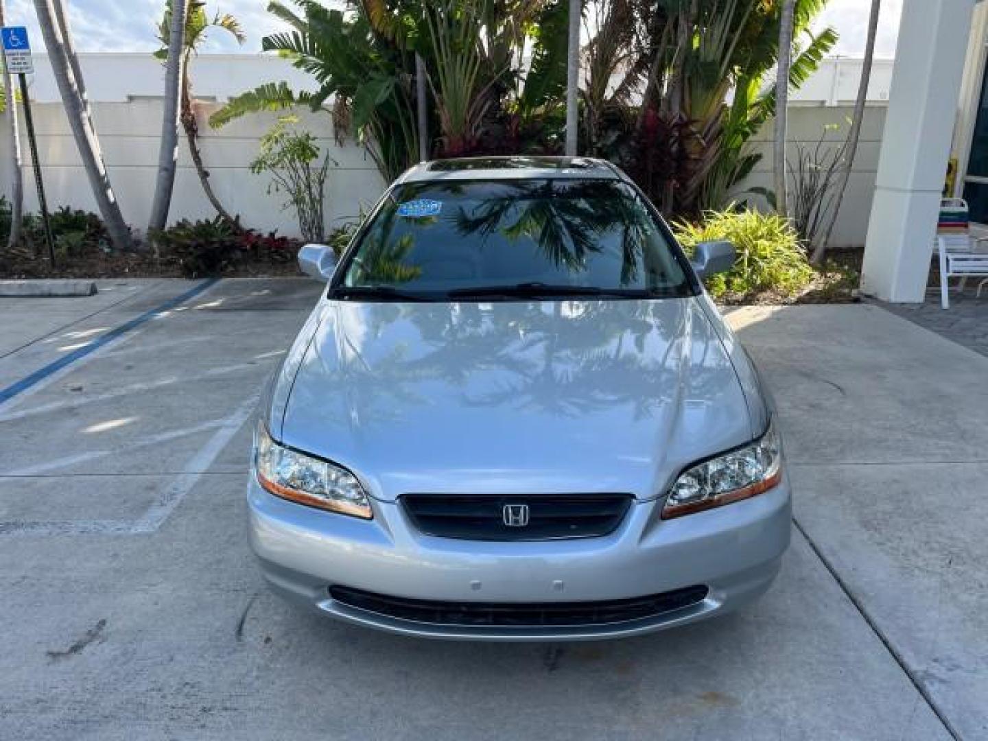 2000 Satin Silver Metallic /Charcoal Honda Accord Cpe EX w/Leather LOW MILES 70,130 (1HGCG2250YA) with an 3.0L SOHC VTEC 24-Valve V6 LEV-Certified Engine engine, Automatic transmission, located at 4701 North Dixie Hwy, Pompano Beach, FL, 33064, (954) 422-2889, 26.240938, -80.123474 - OUR WEBPAGE FLORIDACARS1.COM HAS OVER 100 PHOTOS AND FREE CARFAX LINK 2000 HONDA ACCORD EX V6 ROAD READY 3.0L V6 VIN: 1HGCG2250YA038316 FLORIDA OWNER COUPE POWER LEATHER SEATS 3.0L V6 F SOHC 24V POWER SUNROOF GASOLINE 28 MPG FRONT WHEEL DRIVE LOW MILES 70,130 Alloy Wheels Anti-Theft System Automatic - Photo#2