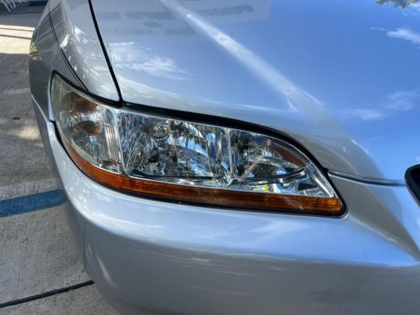 2000 Satin Silver Metallic /Charcoal Honda Accord Cpe EX w/Leather LOW MILES 70,130 (1HGCG2250YA) with an 3.0L SOHC VTEC 24-Valve V6 LEV-Certified Engine engine, Automatic transmission, located at 4701 North Dixie Hwy, Pompano Beach, FL, 33064, (954) 422-2889, 26.240938, -80.123474 - OUR WEBPAGE FLORIDACARS1.COM HAS OVER 100 PHOTOS AND FREE CARFAX LINK 2000 HONDA ACCORD EX V6 ROAD READY 3.0L V6 VIN: 1HGCG2250YA038316 FLORIDA OWNER COUPE POWER LEATHER SEATS 3.0L V6 F SOHC 24V POWER SUNROOF GASOLINE 28 MPG FRONT WHEEL DRIVE LOW MILES 70,130 Alloy Wheels Anti-Theft System Automatic - Photo#63