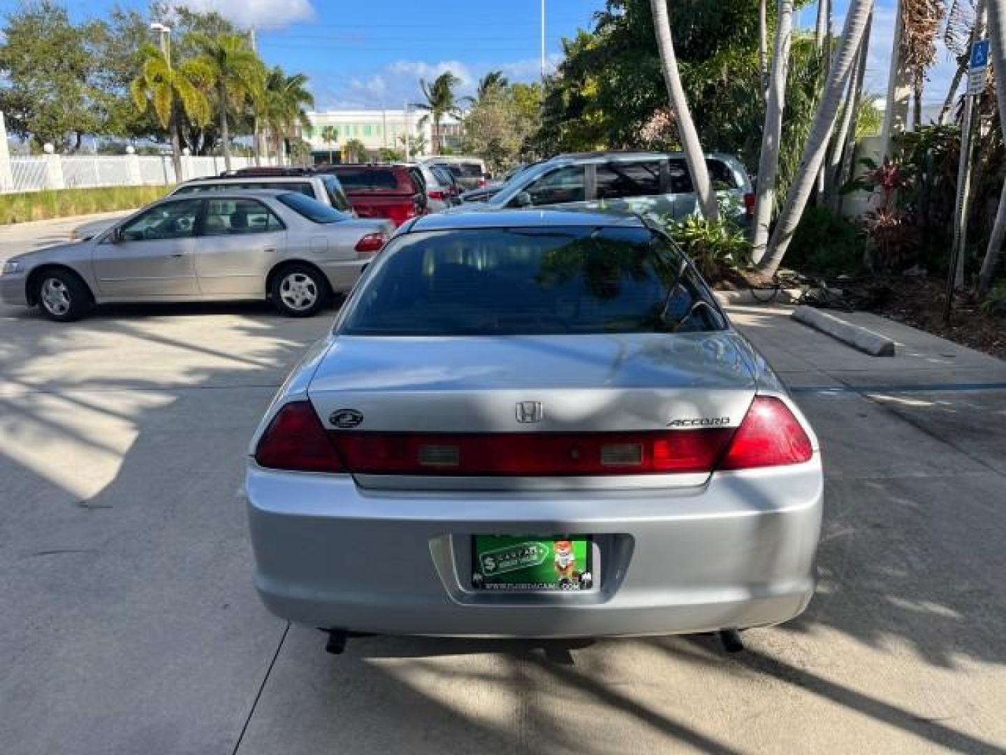 2000 Satin Silver Metallic /Charcoal Honda Accord Cpe EX w/Leather LOW MILES 70,130 (1HGCG2250YA) with an 3.0L SOHC VTEC 24-Valve V6 LEV-Certified Engine engine, Automatic transmission, located at 4701 North Dixie Hwy, Pompano Beach, FL, 33064, (954) 422-2889, 26.240938, -80.123474 - OUR WEBPAGE FLORIDACARS1.COM HAS OVER 100 PHOTOS AND FREE CARFAX LINK 2000 HONDA ACCORD EX V6 ROAD READY 3.0L V6 VIN: 1HGCG2250YA038316 FLORIDA OWNER COUPE POWER LEATHER SEATS 3.0L V6 F SOHC 24V POWER SUNROOF GASOLINE 28 MPG FRONT WHEEL DRIVE LOW MILES 70,130 Alloy Wheels Anti-Theft System Automatic - Photo#6