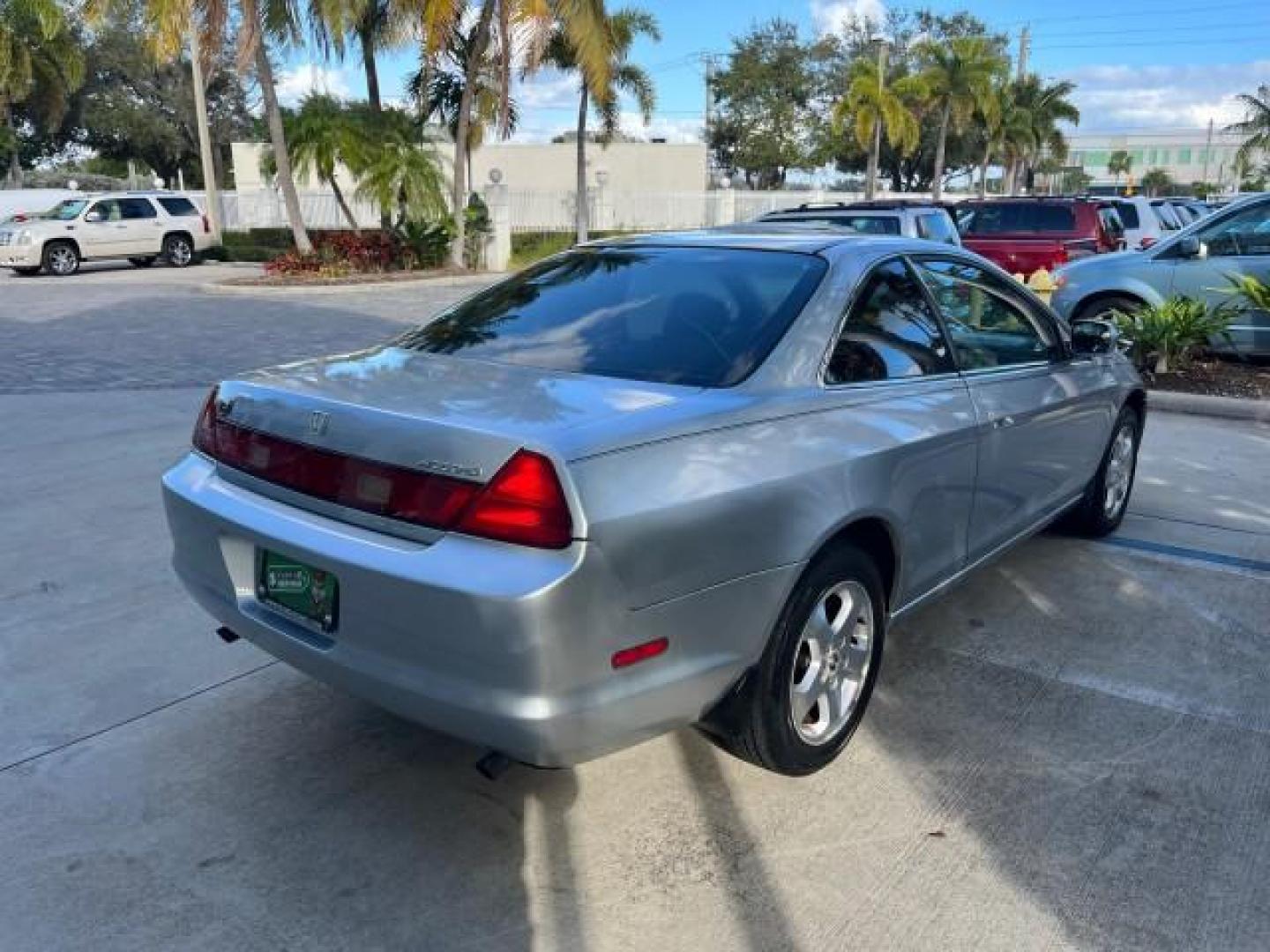 2000 Satin Silver Metallic /Charcoal Honda Accord Cpe EX w/Leather LOW MILES 70,130 (1HGCG2250YA) with an 3.0L SOHC VTEC 24-Valve V6 LEV-Certified Engine engine, Automatic transmission, located at 4701 North Dixie Hwy, Pompano Beach, FL, 33064, (954) 422-2889, 26.240938, -80.123474 - OUR WEBPAGE FLORIDACARS1.COM HAS OVER 100 PHOTOS AND FREE CARFAX LINK 2000 HONDA ACCORD EX V6 ROAD READY 3.0L V6 VIN: 1HGCG2250YA038316 FLORIDA OWNER COUPE POWER LEATHER SEATS 3.0L V6 F SOHC 24V POWER SUNROOF GASOLINE 28 MPG FRONT WHEEL DRIVE LOW MILES 70,130 Alloy Wheels Anti-Theft System Automatic - Photo#75