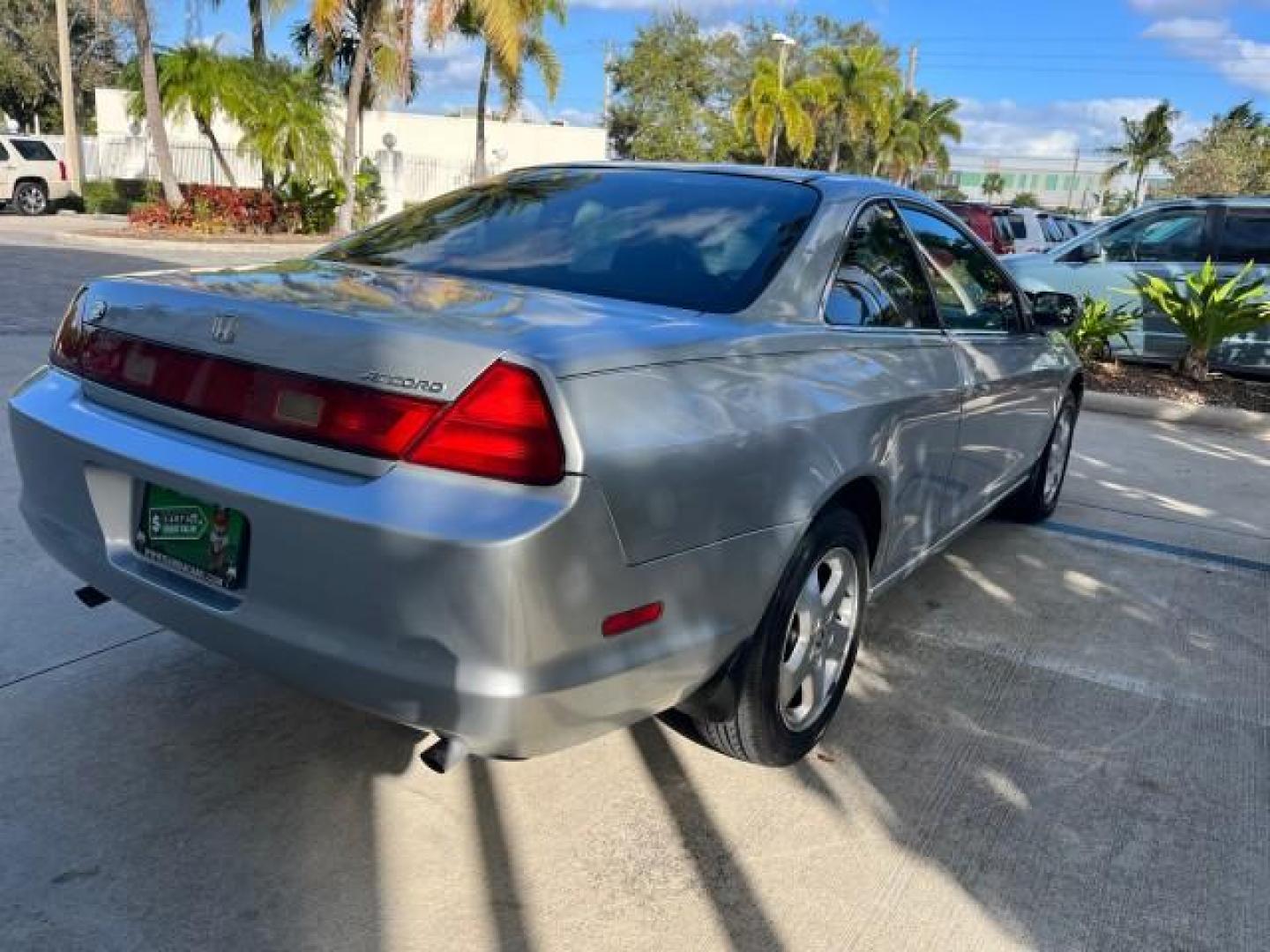 2000 Satin Silver Metallic /Charcoal Honda Accord Cpe EX w/Leather LOW MILES 70,130 (1HGCG2250YA) with an 3.0L SOHC VTEC 24-Valve V6 LEV-Certified Engine engine, Automatic transmission, located at 4701 North Dixie Hwy, Pompano Beach, FL, 33064, (954) 422-2889, 26.240938, -80.123474 - OUR WEBPAGE FLORIDACARS1.COM HAS OVER 100 PHOTOS AND FREE CARFAX LINK 2000 HONDA ACCORD EX V6 ROAD READY 3.0L V6 VIN: 1HGCG2250YA038316 FLORIDA OWNER COUPE POWER LEATHER SEATS 3.0L V6 F SOHC 24V POWER SUNROOF GASOLINE 28 MPG FRONT WHEEL DRIVE LOW MILES 70,130 Alloy Wheels Anti-Theft System Automatic - Photo#77