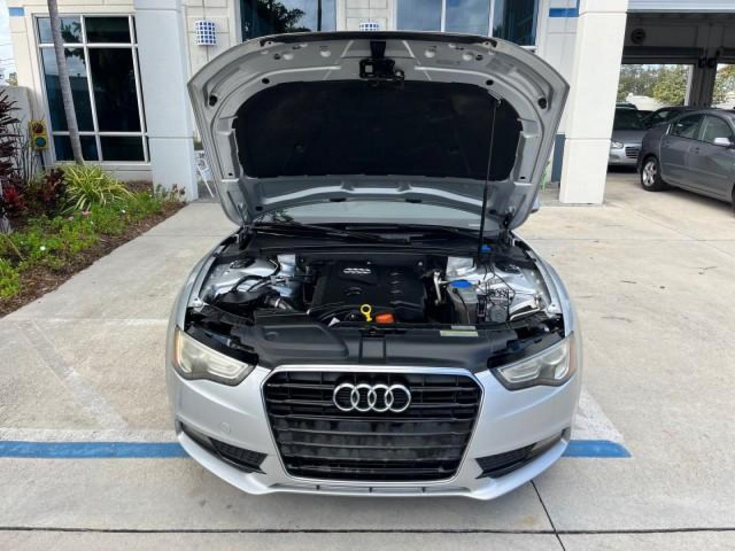 2014 Ice Silver Metallic/Brown Roof /Black Audi A5 Premium Plus LOW MILES 117,819 (WAULFAFH2EN) with an 2.0L TFSI 4-Cyl Engine engine, Automatic transmission, located at 4701 North Dixie Hwy, Pompano Beach, FL, 33064, (954) 422-2889, 26.240938, -80.123474 - OUR WEBPAGE FLORIDACARS1.COM HAS OVER 100 PHOTOS AND FREE CARFAX LINK 2014 AUDI A5 2.0T QUATTRO PREMIUM PLUS ROAD READY 2.0L I4 TURBO VIN: WAULFAFH2EN012656 NO ACCIDENTS NO RECALLS CONVERTIBLE NEW $58,075 POWER CONVERTIBLE TOP 2.0L I4 F DOHC 16V QUATTRO POWER LEATHER SEATS 29 MPG FLEX FUEL DUAL AC A - Photo#64