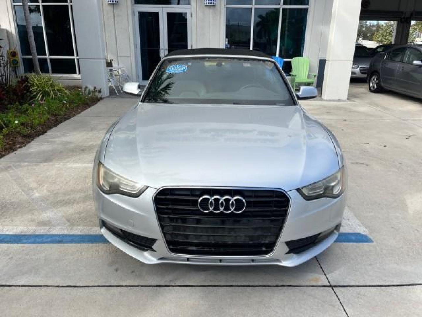 2014 Ice Silver Metallic/Brown Roof /Black Audi A5 Premium Plus LOW MILES 117,819 (WAULFAFH2EN) with an 2.0L TFSI 4-Cyl Engine engine, Automatic transmission, located at 4701 North Dixie Hwy, Pompano Beach, FL, 33064, (954) 422-2889, 26.240938, -80.123474 - OUR WEBPAGE FLORIDACARS1.COM HAS OVER 100 PHOTOS AND FREE CARFAX LINK 2014 AUDI A5 2.0T QUATTRO PREMIUM PLUS ROAD READY 2.0L I4 TURBO VIN: WAULFAFH2EN012656 NO ACCIDENTS NO RECALLS CONVERTIBLE NEW $58,075 POWER CONVERTIBLE TOP 2.0L I4 F DOHC 16V QUATTRO POWER LEATHER SEATS 29 MPG FLEX FUEL DUAL AC A - Photo#70