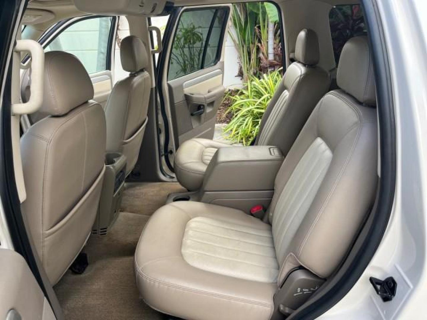 2005 Light French Silk Metallic /Midnight Grey Mercury Mountaineer Premier LOW MILES 49,983 (4M2DU66W55Z) with an 4.6L SOHC SMPI V8 Engine engine, Automatic transmission, located at 4701 North Dixie Hwy, Pompano Beach, FL, 33064, (954) 422-2889, 26.240938, -80.123474 - OUR WEBPAGE FLORIDACARS1.COM HAS OVER 100 PHOTOS AND FREE CARFAX LINK 2005 MERCURY MOUNTAINEER CONVENIENCE ROAD READY 4.6L V8 VIN: 4M2DU66W55ZJ20944 LOW MILES 49,983 4 DOOR WAGON/SPORT UTILITY NO RECALLS DVD SUNROOF 4.6L V8 F POWER LEATHER SEATS GASOLINE POWER SUNROOF/MIRRORS REAR WHEEL DRIVE 3 ROW - Photo#14