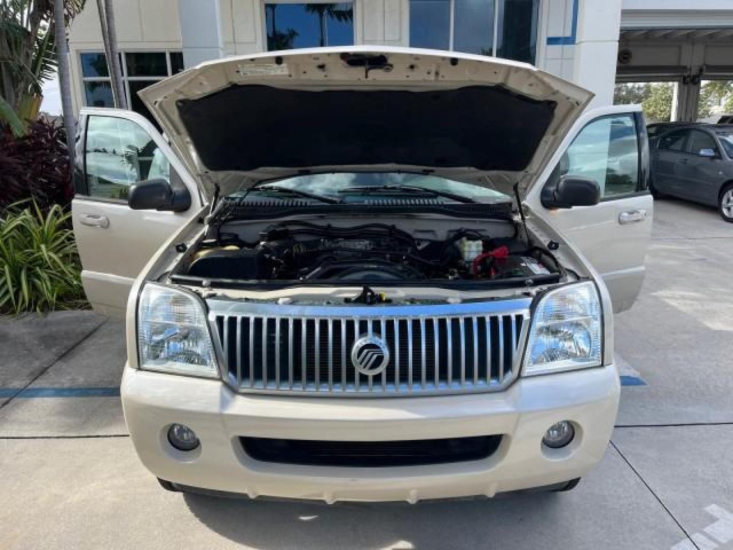 2005 Light French Silk Metallic /Midnight Grey Mercury Mountaineer Premier LOW MILES 49,983 (4M2DU66W55Z) with an 4.6L SOHC SMPI V8 Engine engine, Automatic transmission, located at 4701 North Dixie Hwy, Pompano Beach, FL, 33064, (954) 422-2889, 26.240938, -80.123474 - OUR WEBPAGE FLORIDACARS1.COM HAS OVER 100 PHOTOS AND FREE CARFAX LINK 2005 MERCURY MOUNTAINEER CONVENIENCE ROAD READY 4.6L V8 VIN: 4M2DU66W55ZJ20944 LOW MILES 49,983 4 DOOR WAGON/SPORT UTILITY NO RECALLS DVD SUNROOF 4.6L V8 F POWER LEATHER SEATS GASOLINE POWER SUNROOF/MIRRORS REAR WHEEL DRIVE 3 ROW - Photo#16