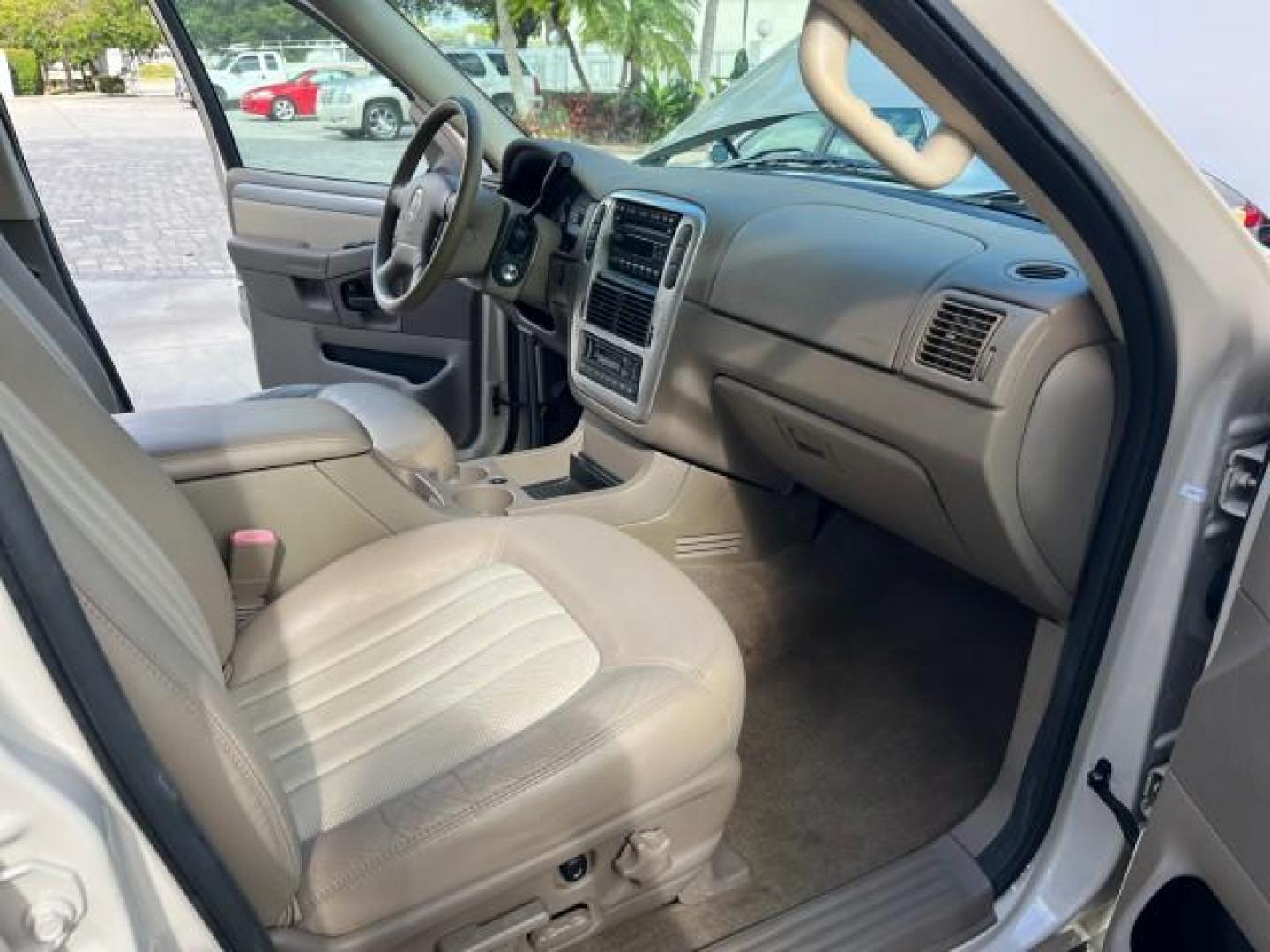 2005 Light French Silk Metallic /Midnight Grey Mercury Mountaineer Premier LOW MILES 49,983 (4M2DU66W55Z) with an 4.6L SOHC SMPI V8 Engine engine, Automatic transmission, located at 4701 North Dixie Hwy, Pompano Beach, FL, 33064, (954) 422-2889, 26.240938, -80.123474 - OUR WEBPAGE FLORIDACARS1.COM HAS OVER 100 PHOTOS AND FREE CARFAX LINK 2005 MERCURY MOUNTAINEER CONVENIENCE ROAD READY 4.6L V8 VIN: 4M2DU66W55ZJ20944 LOW MILES 49,983 4 DOOR WAGON/SPORT UTILITY NO RECALLS DVD SUNROOF 4.6L V8 F POWER LEATHER SEATS GASOLINE POWER SUNROOF/MIRRORS REAR WHEEL DRIVE 3 ROW - Photo#26