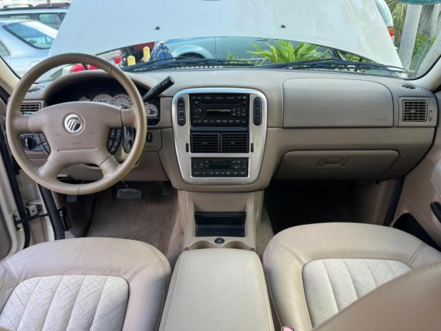 2005 Light French Silk Metallic /Midnight Grey Mercury Mountaineer Premier LOW MILES 49,983 (4M2DU66W55Z) with an 4.6L SOHC SMPI V8 Engine engine, Automatic transmission, located at 4701 North Dixie Hwy, Pompano Beach, FL, 33064, (954) 422-2889, 26.240938, -80.123474 - OUR WEBPAGE FLORIDACARS1.COM HAS OVER 100 PHOTOS AND FREE CARFAX LINK 2005 MERCURY MOUNTAINEER CONVENIENCE ROAD READY 4.6L V8 VIN: 4M2DU66W55ZJ20944 LOW MILES 49,983 4 DOOR WAGON/SPORT UTILITY NO RECALLS DVD SUNROOF 4.6L V8 F POWER LEATHER SEATS GASOLINE POWER SUNROOF/MIRRORS REAR WHEEL DRIVE 3 ROW - Photo#33