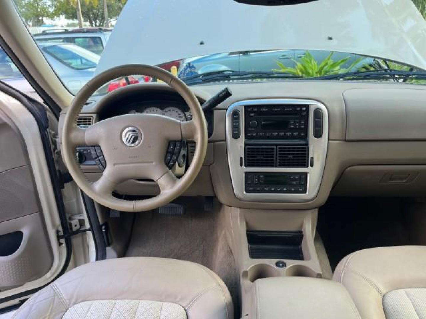 2005 Light French Silk Metallic /Midnight Grey Mercury Mountaineer Premier LOW MILES 49,983 (4M2DU66W55Z) with an 4.6L SOHC SMPI V8 Engine engine, Automatic transmission, located at 4701 North Dixie Hwy, Pompano Beach, FL, 33064, (954) 422-2889, 26.240938, -80.123474 - OUR WEBPAGE FLORIDACARS1.COM HAS OVER 100 PHOTOS AND FREE CARFAX LINK 2005 MERCURY MOUNTAINEER CONVENIENCE ROAD READY 4.6L V8 VIN: 4M2DU66W55ZJ20944 LOW MILES 49,983 4 DOOR WAGON/SPORT UTILITY NO RECALLS DVD SUNROOF 4.6L V8 F POWER LEATHER SEATS GASOLINE POWER SUNROOF/MIRRORS REAR WHEEL DRIVE 3 ROW - Photo#34