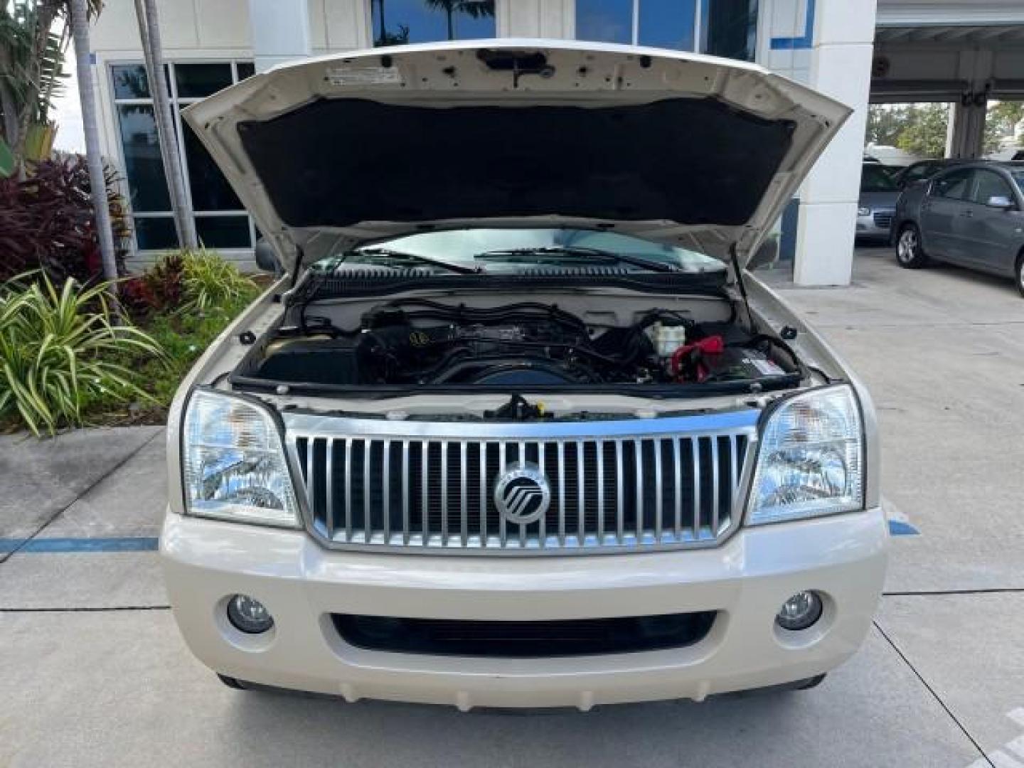 2005 Light French Silk Metallic /Midnight Grey Mercury Mountaineer Premier LOW MILES 49,983 (4M2DU66W55Z) with an 4.6L SOHC SMPI V8 Engine engine, Automatic transmission, located at 4701 North Dixie Hwy, Pompano Beach, FL, 33064, (954) 422-2889, 26.240938, -80.123474 - OUR WEBPAGE FLORIDACARS1.COM HAS OVER 100 PHOTOS AND FREE CARFAX LINK 2005 MERCURY MOUNTAINEER CONVENIENCE ROAD READY 4.6L V8 VIN: 4M2DU66W55ZJ20944 LOW MILES 49,983 4 DOOR WAGON/SPORT UTILITY NO RECALLS DVD SUNROOF 4.6L V8 F POWER LEATHER SEATS GASOLINE POWER SUNROOF/MIRRORS REAR WHEEL DRIVE 3 ROW - Photo#69