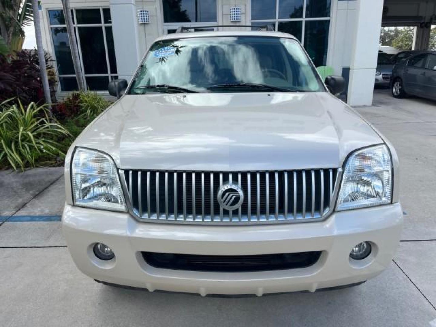 2005 Light French Silk Metallic /Midnight Grey Mercury Mountaineer Premier LOW MILES 49,983 (4M2DU66W55Z) with an 4.6L SOHC SMPI V8 Engine engine, Automatic transmission, located at 4701 North Dixie Hwy, Pompano Beach, FL, 33064, (954) 422-2889, 26.240938, -80.123474 - OUR WEBPAGE FLORIDACARS1.COM HAS OVER 100 PHOTOS AND FREE CARFAX LINK 2005 MERCURY MOUNTAINEER CONVENIENCE ROAD READY 4.6L V8 VIN: 4M2DU66W55ZJ20944 LOW MILES 49,983 4 DOOR WAGON/SPORT UTILITY NO RECALLS DVD SUNROOF 4.6L V8 F POWER LEATHER SEATS GASOLINE POWER SUNROOF/MIRRORS REAR WHEEL DRIVE 3 ROW - Photo#73